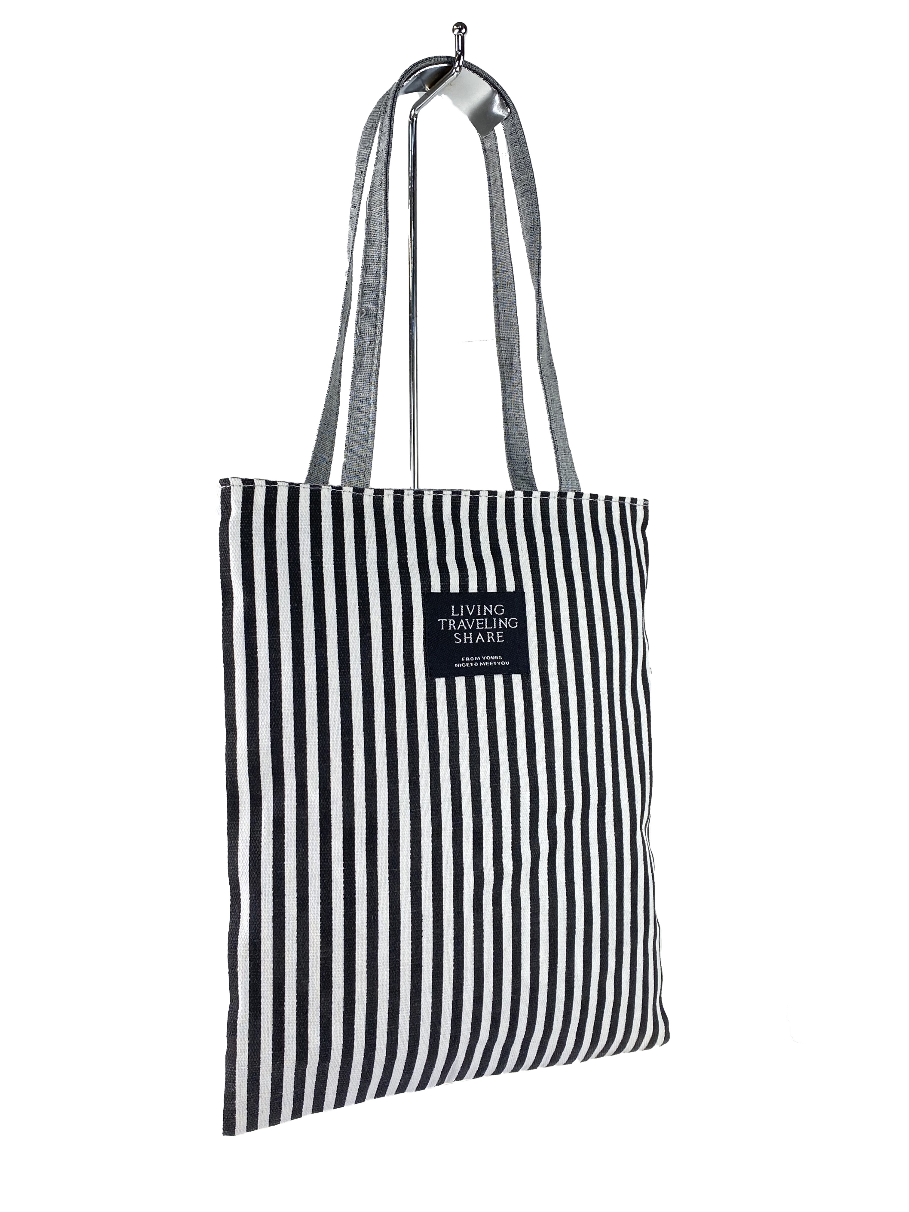 На фото 1 - Летняя женская сумка-шоппер из текстиля в полоску, цвет чёрный с белым
