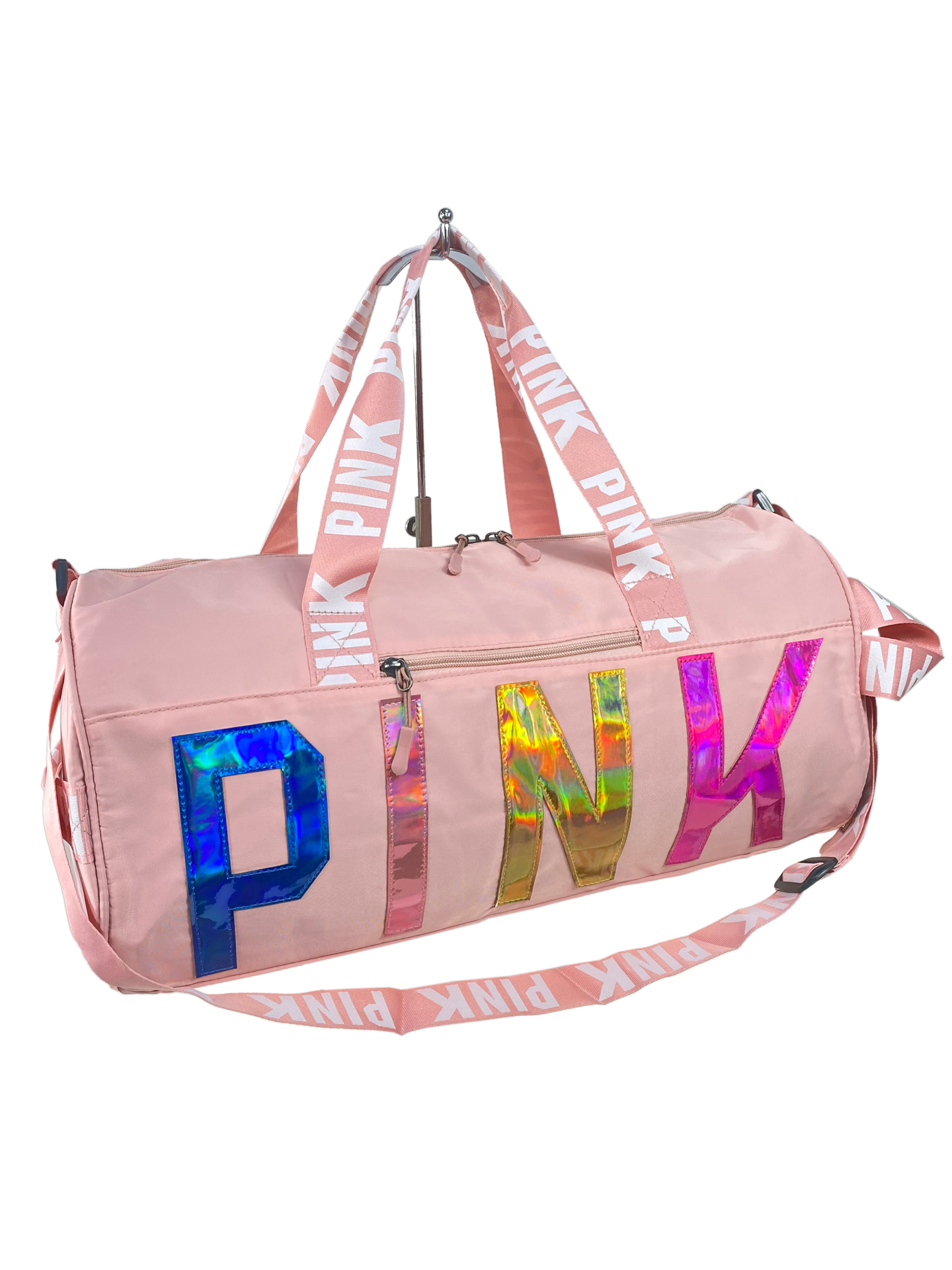 На фото 1 - Дорожная сумка из текстиля  с принтом, цвет розовый