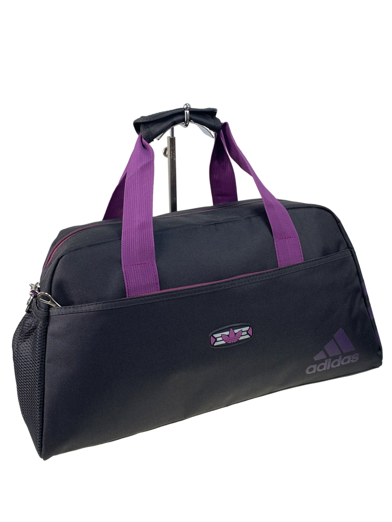 На фото 1 - Дорожная сумка из текстиля, цвет черный с фиолетовым 