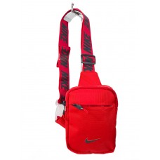 На фото 1 - Женская сумка слинг из текстиля, цвет красный