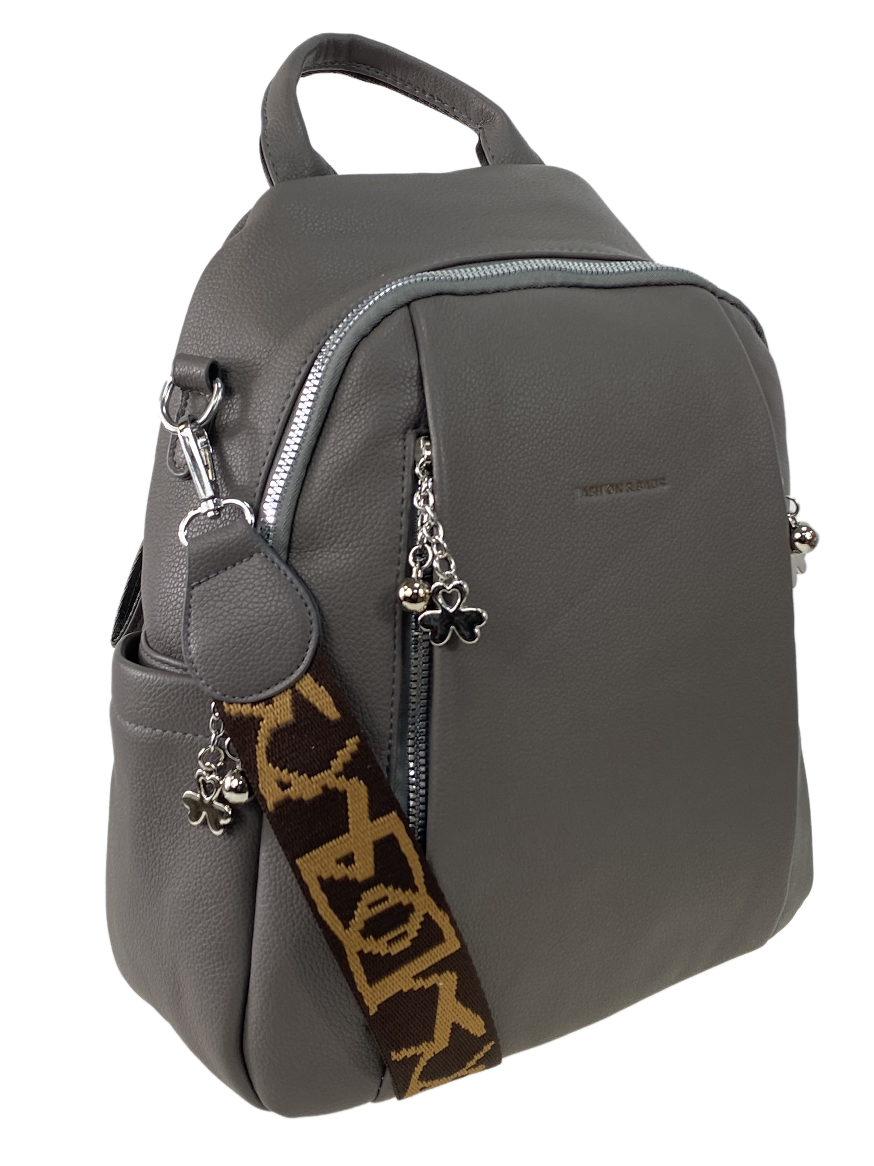 На фото 1 - Женская сумка-рюкзак  из искусственной кожи, цвет темно серый
