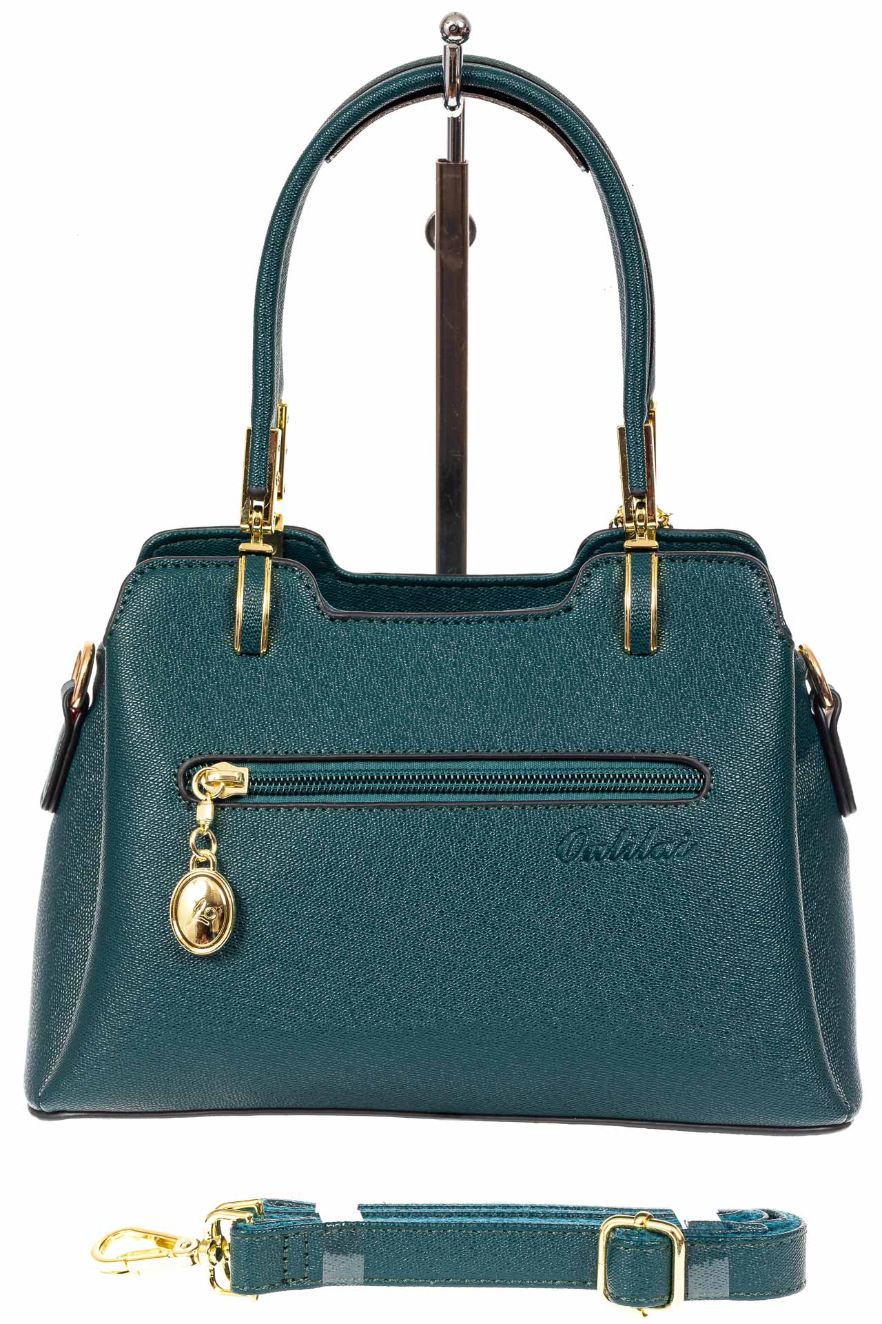 На фото 3 - Женская сумка-трапеция из экокожи с подвеской, цвет сине-зеленый