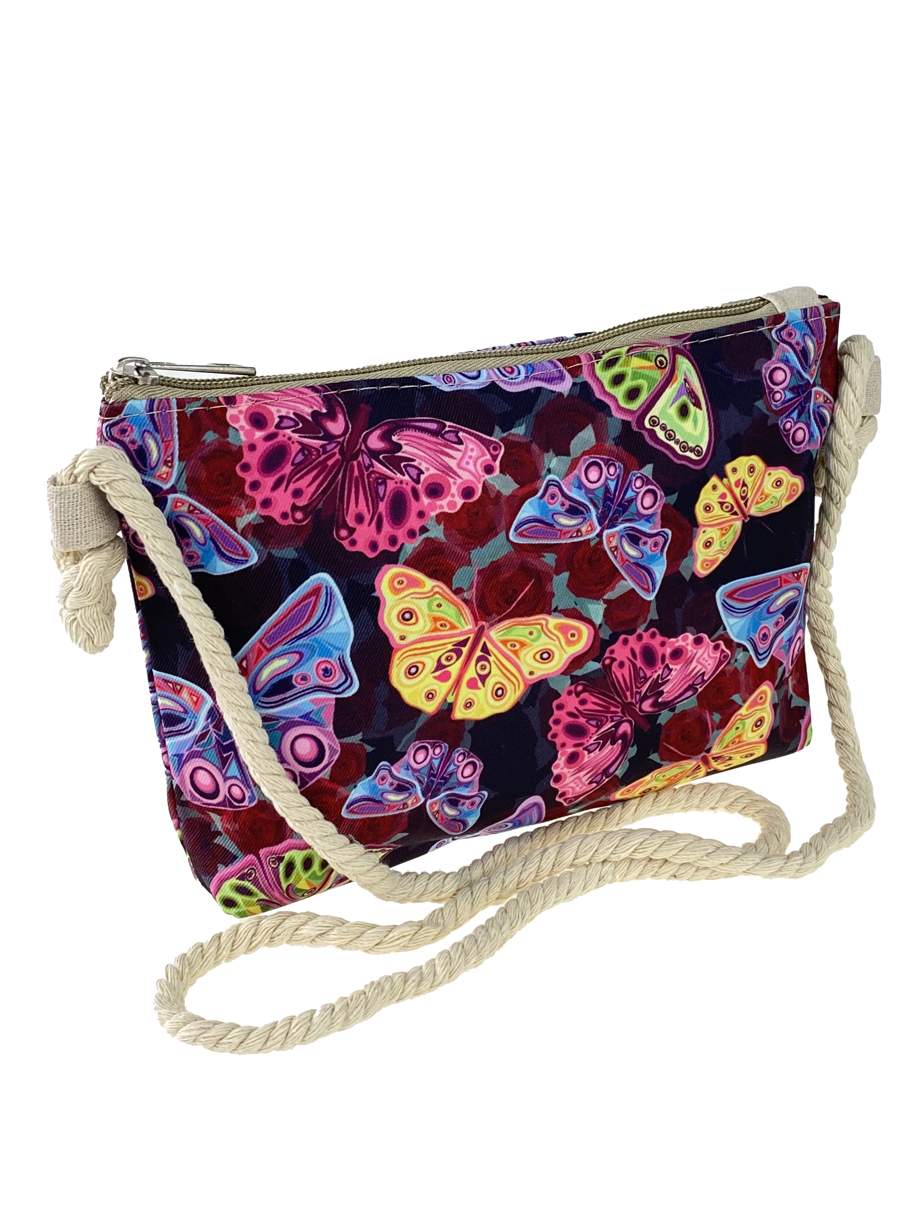 На фото 1 - Детская текстильная сумочка с принтом в виде бабочек, мультицвет