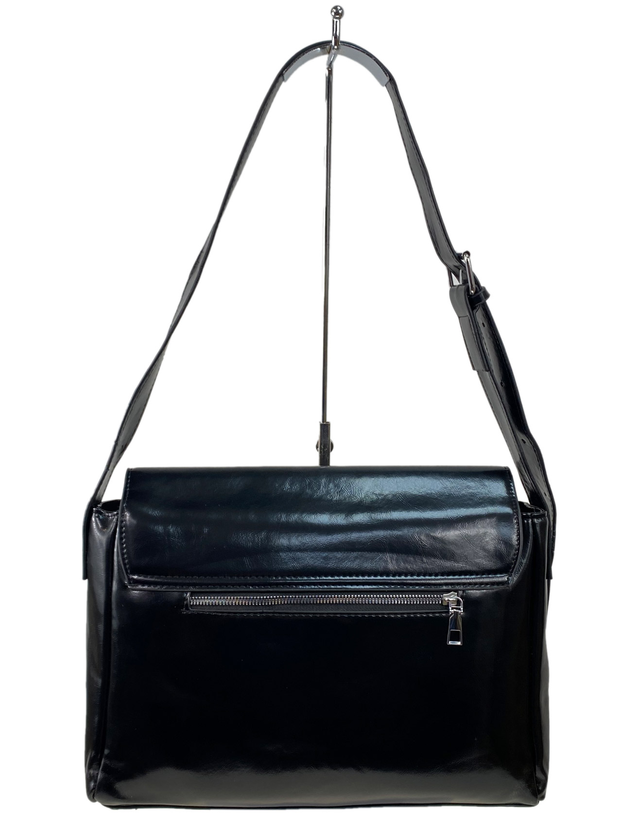 На фото 2 - Женская сумка  из искусственной кожи, цвет черный 