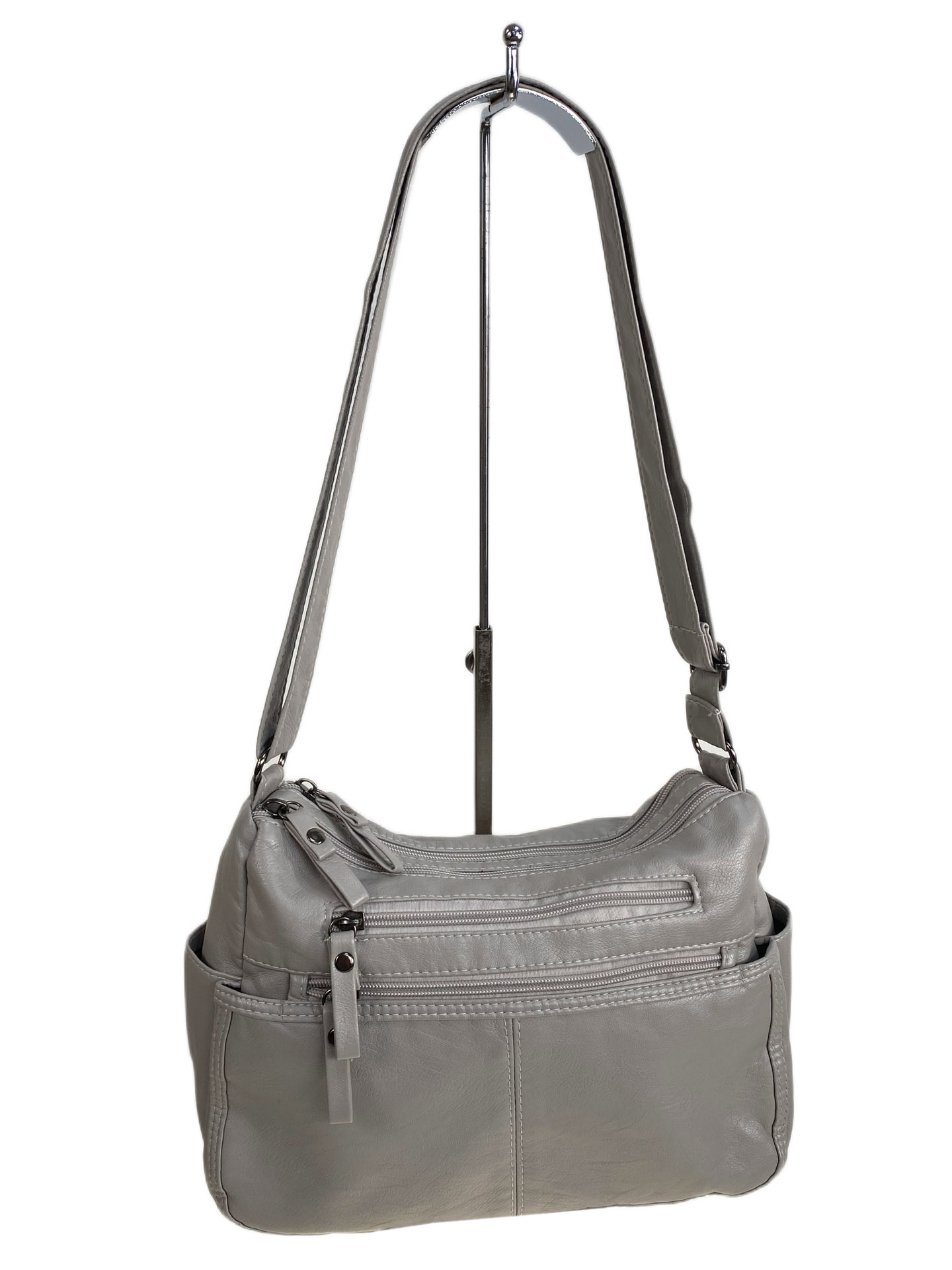 На фото 1 - Женская сумка из искусственной кожи, цвет светло серый