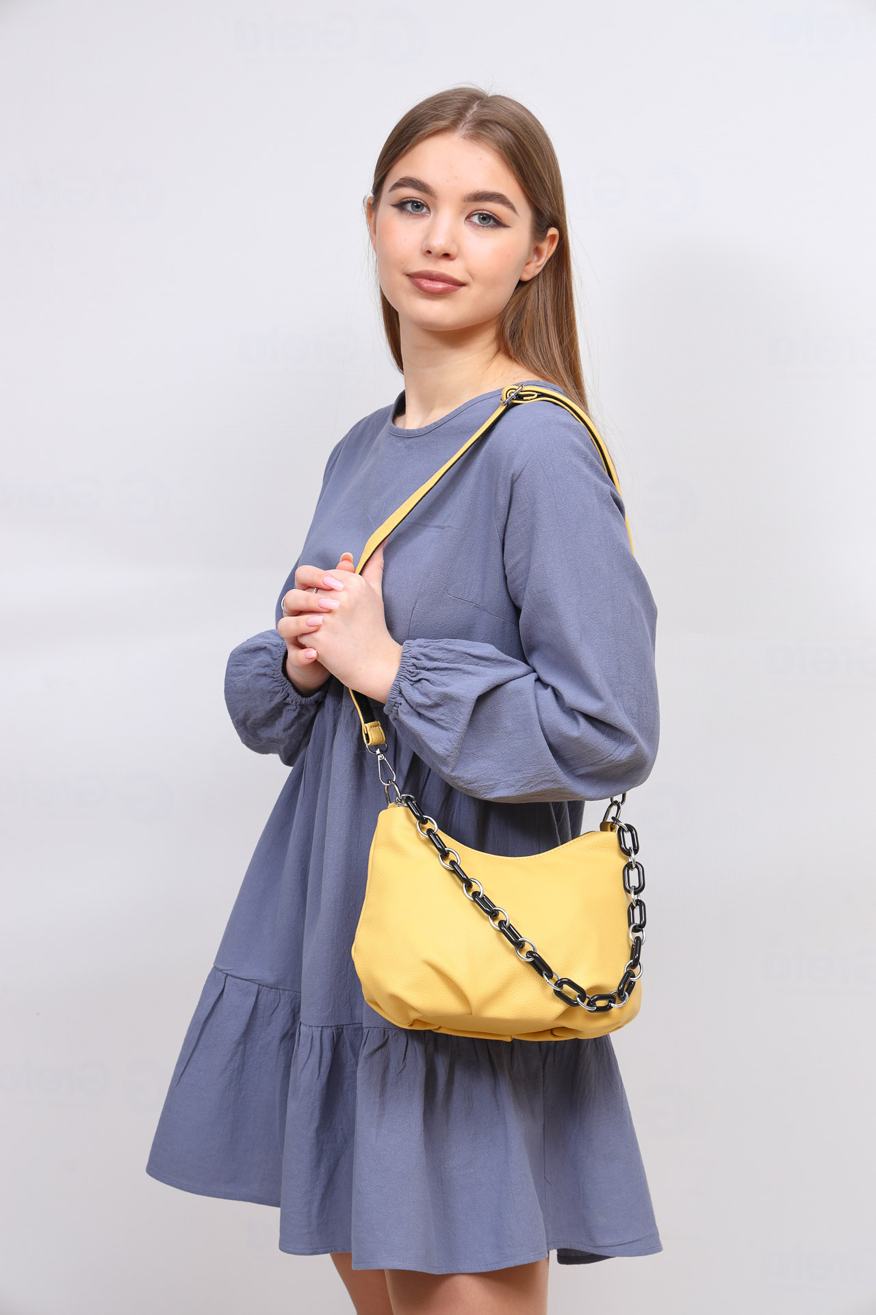 На фото 1 - Женская сумка из искусственной кожи, цвет желтый
