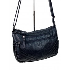 На фото 1 - Женская сумка  из искусственной кожи, цвет черный 