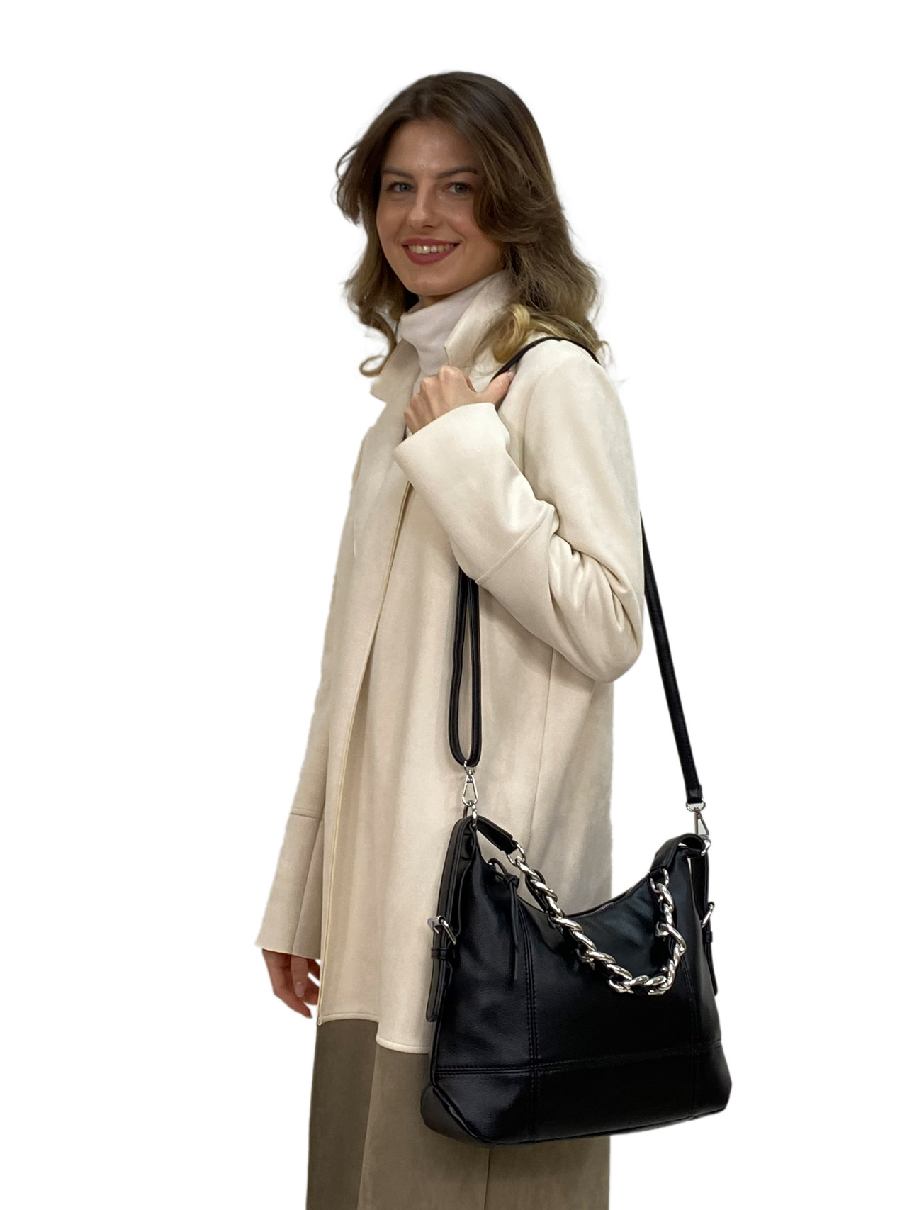 На фото 1 - Женская сумка  из искусственной кожи, цвет черный