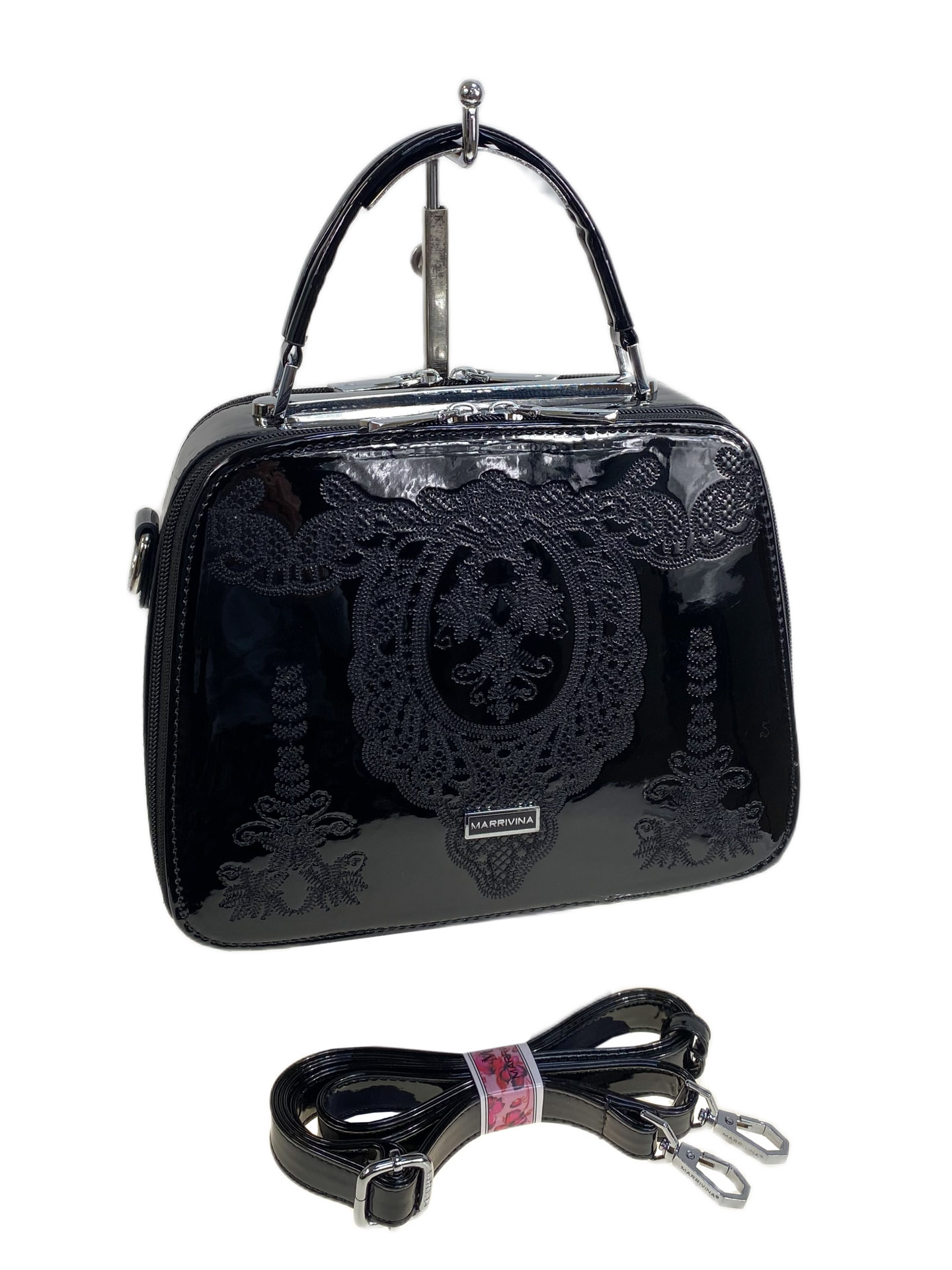 На фото 1 - Женская сумка из искусственной кожи, цвет черный