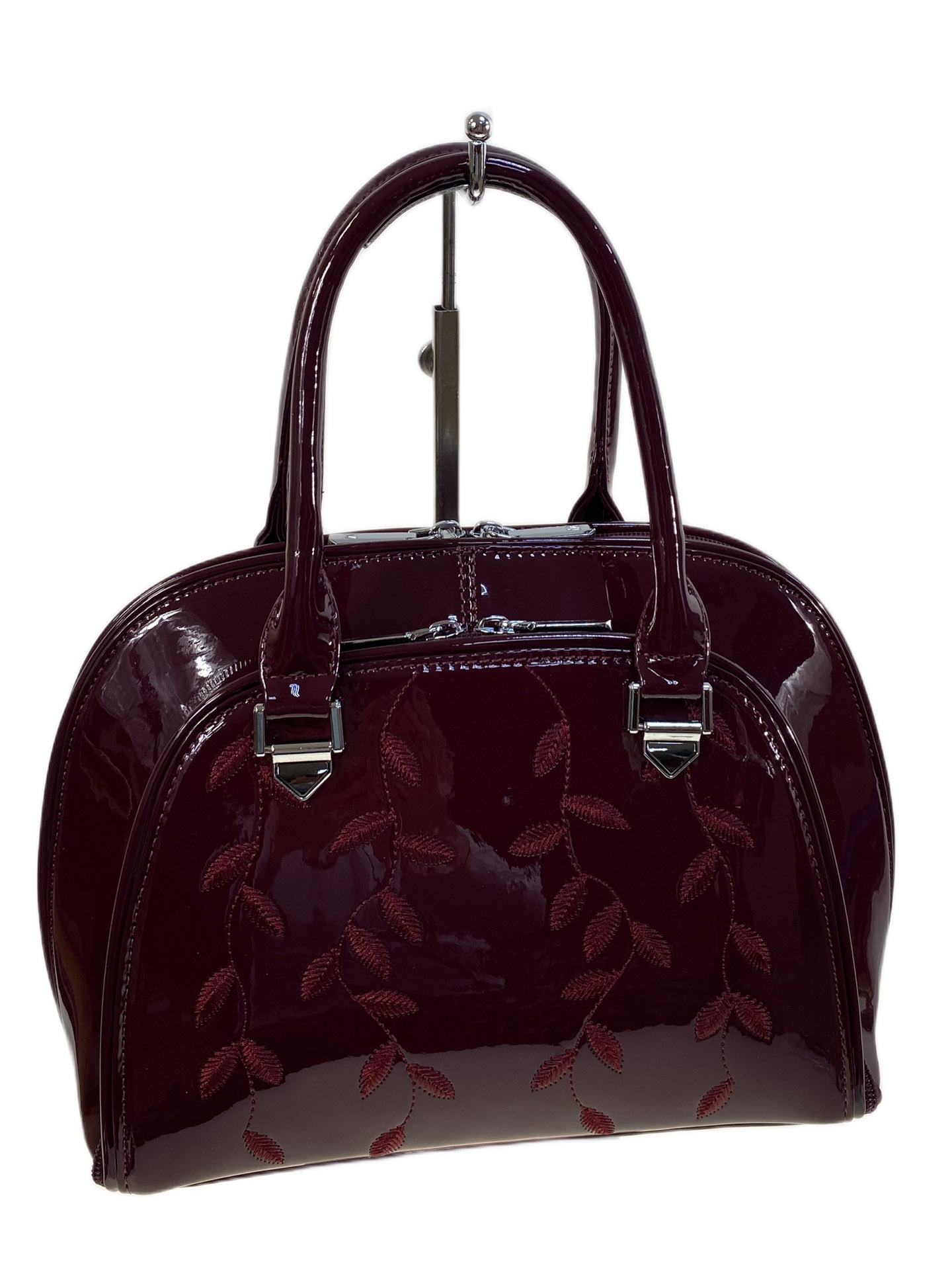 На фото 1 - Женская сумка из искусственной кожи, цвет бордовый