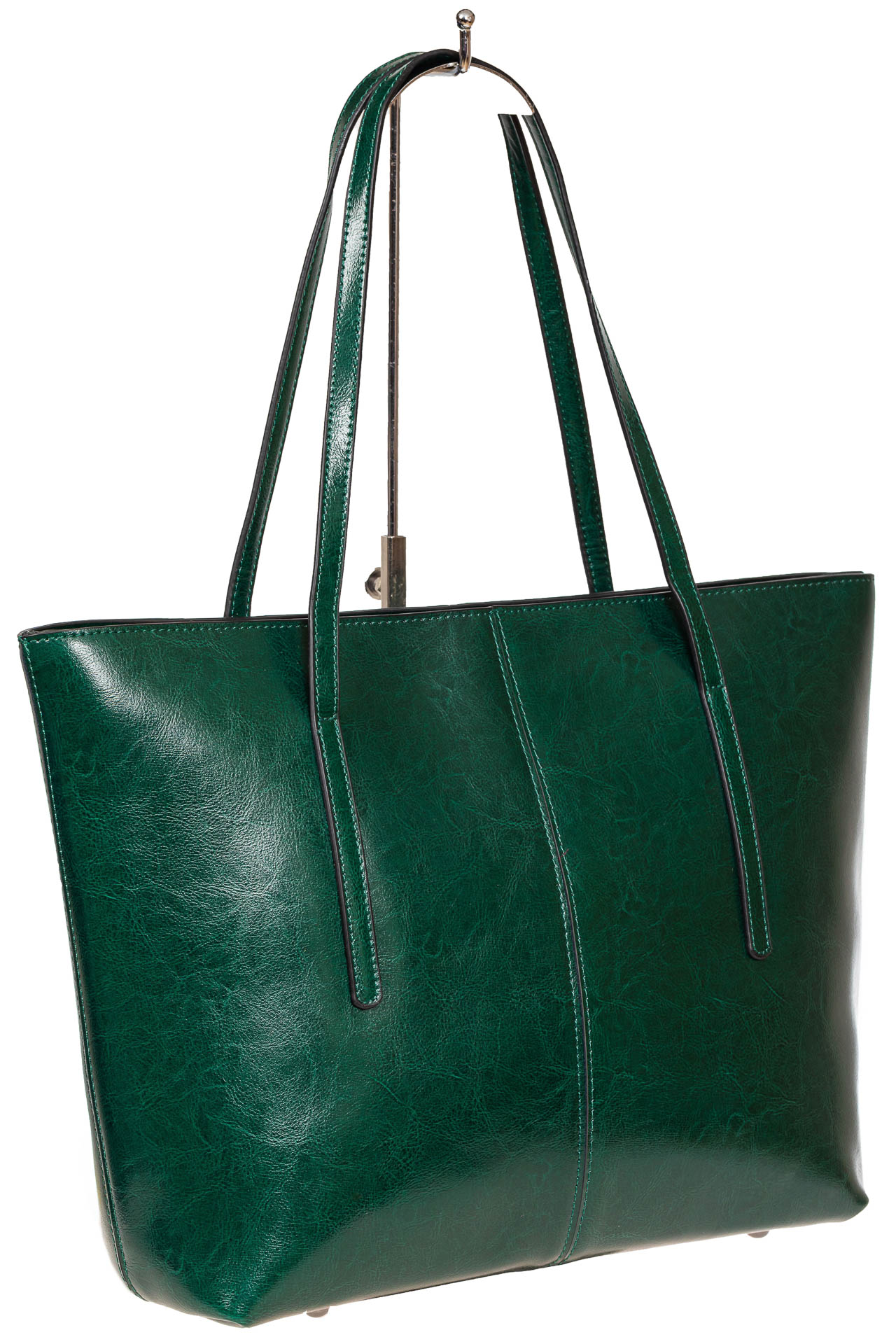 На фото 1 - Кожаная сумка-трапеция, цвет зелёный