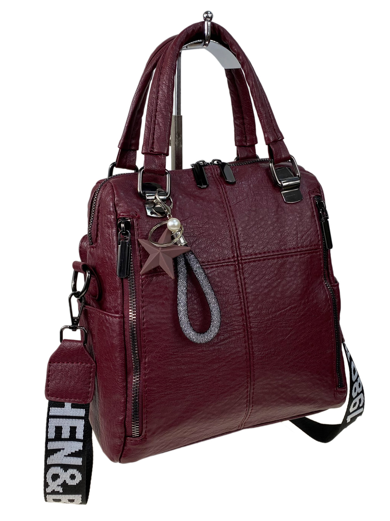 На фото 1 - Женская сумка-рюкзак трансформер из искусственной кожи цвет бордовый