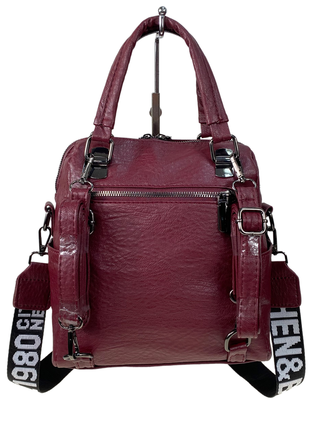 На фото 2 - Женская сумка-рюкзак трансформер из искусственной кожи цвет бордовый