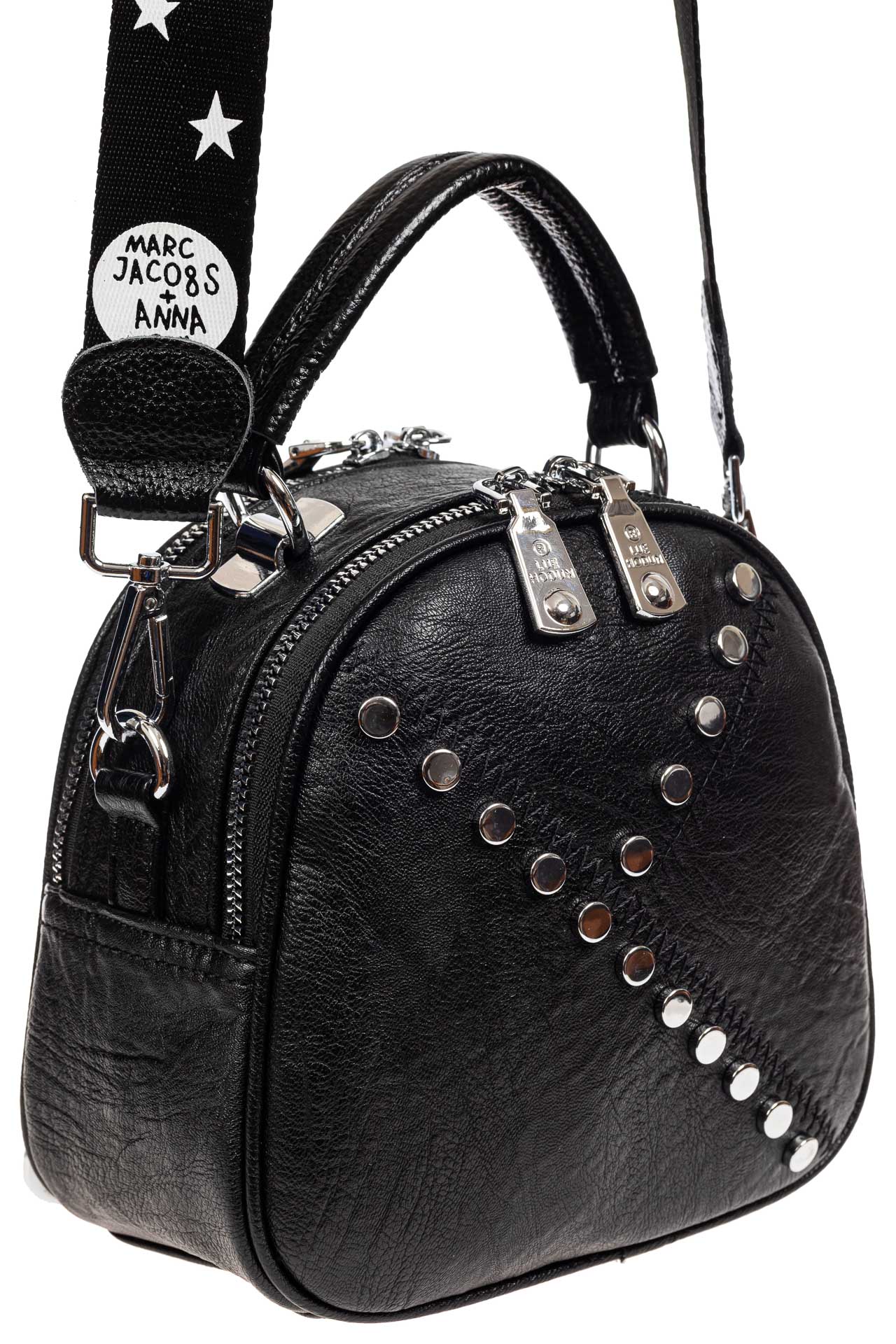 На фото 1 - Круглая сумка-рюкзак из искусственной кожи, цвет черный