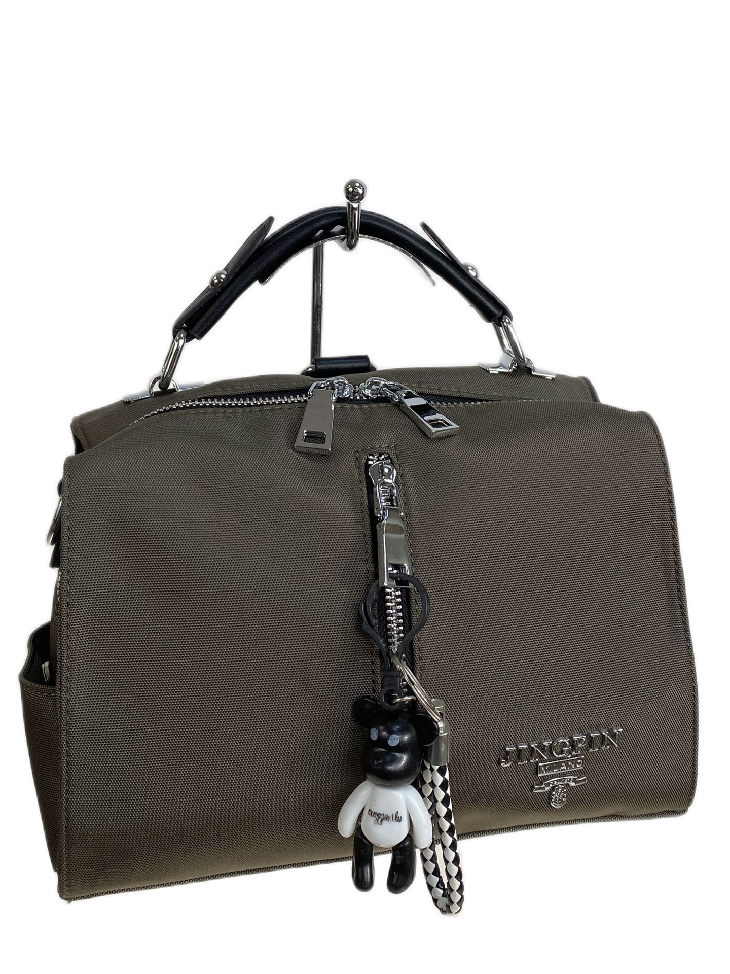 На фото 1 - Женская сумка-рюкзак из текстиля, цвет хаки 