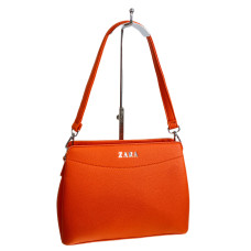 На фото 1 - Женская сумка из искусственной кожи, цвет оранжевый