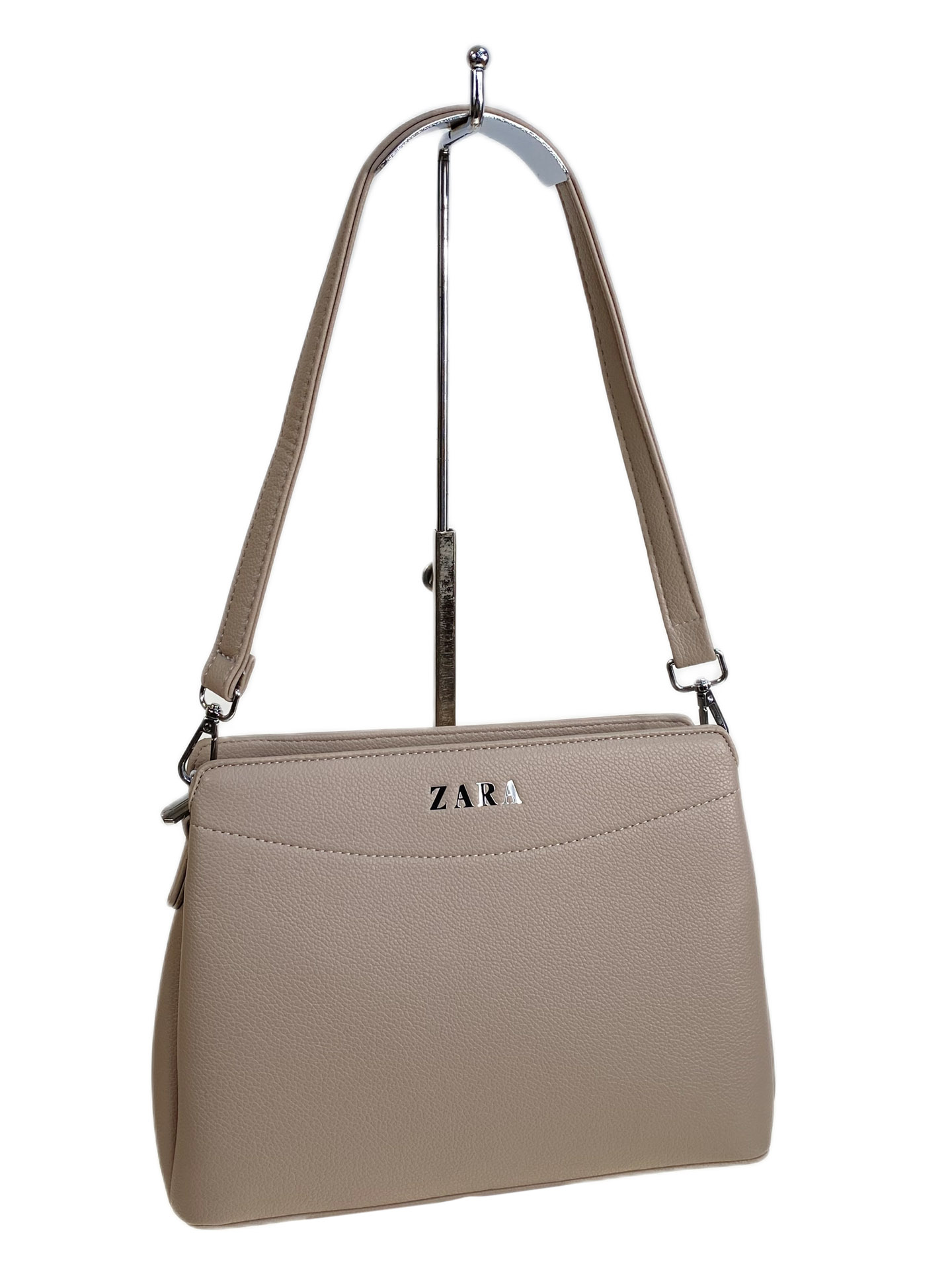 На фото 1 - Женская сумка из искусственной кожи, цвет светло бежевый