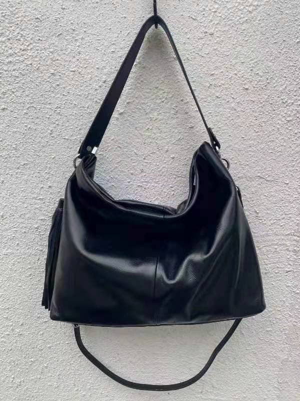На фото 2 - Женская сумка из натуральной кожи, цвет черный
