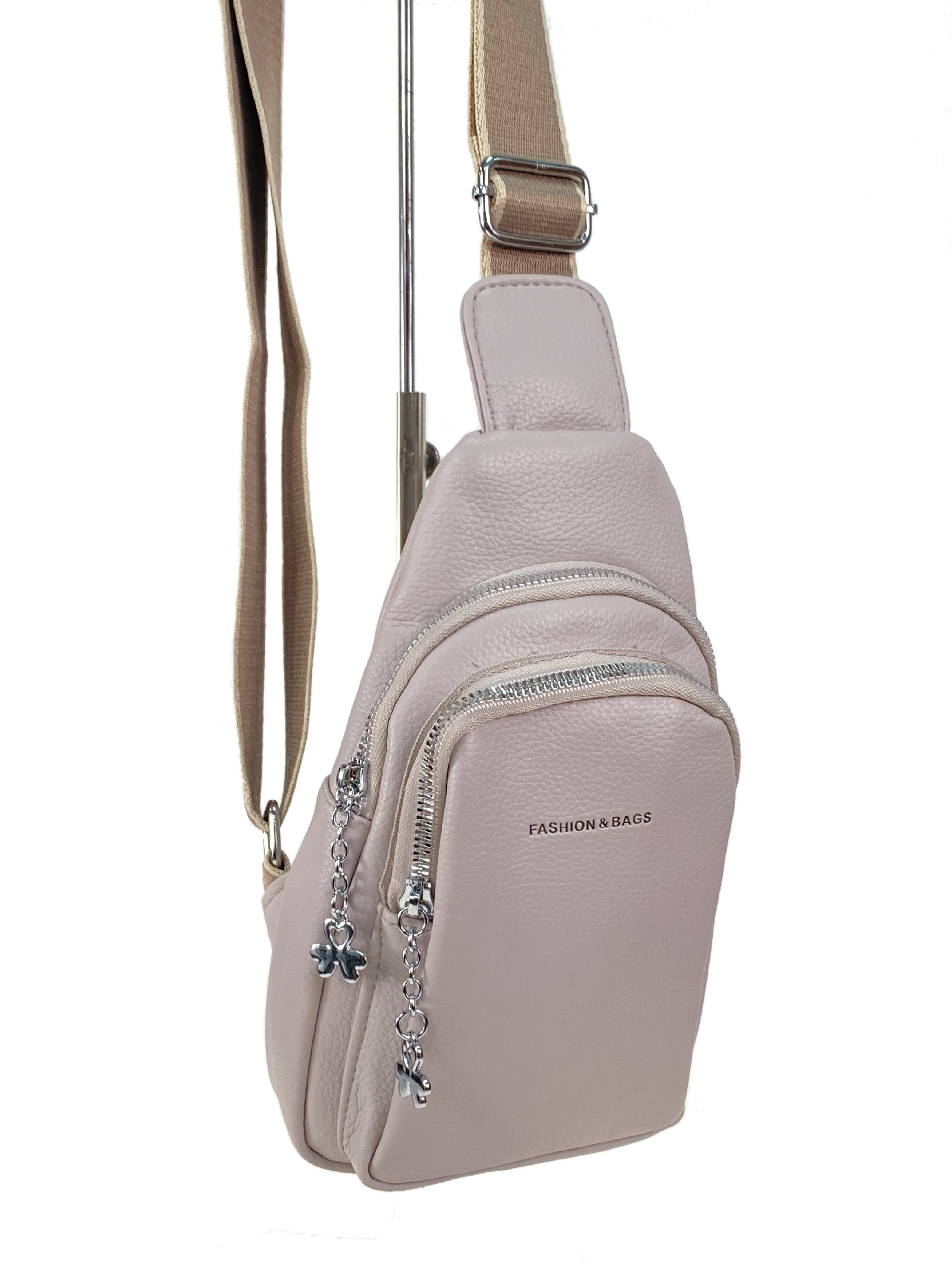 На фото 3 - Женская сумка-слинг из искусственной кожи, цвет светло серый
