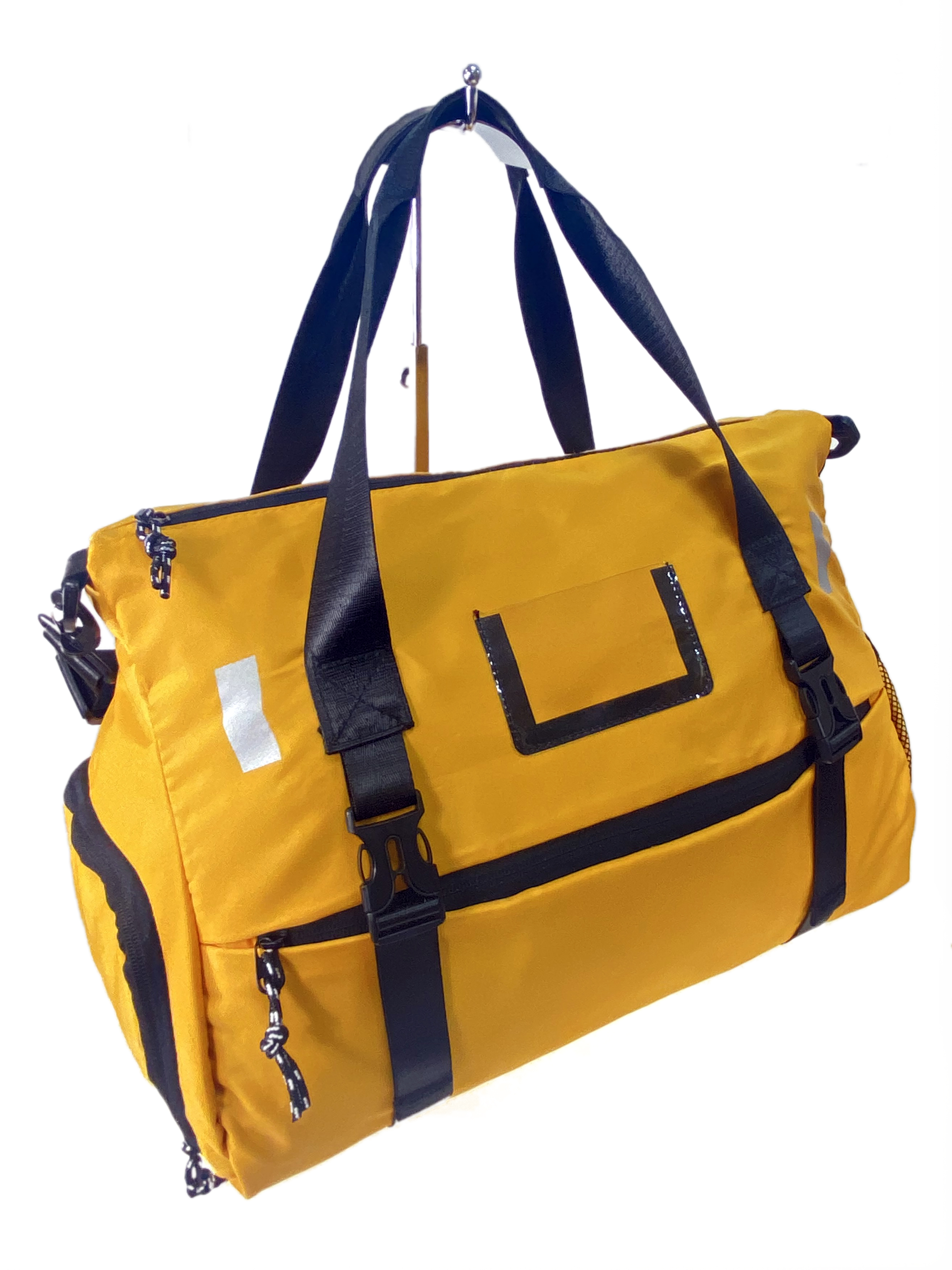 На фото 1 - Дорожная сумка из текстиля , цвет желтый