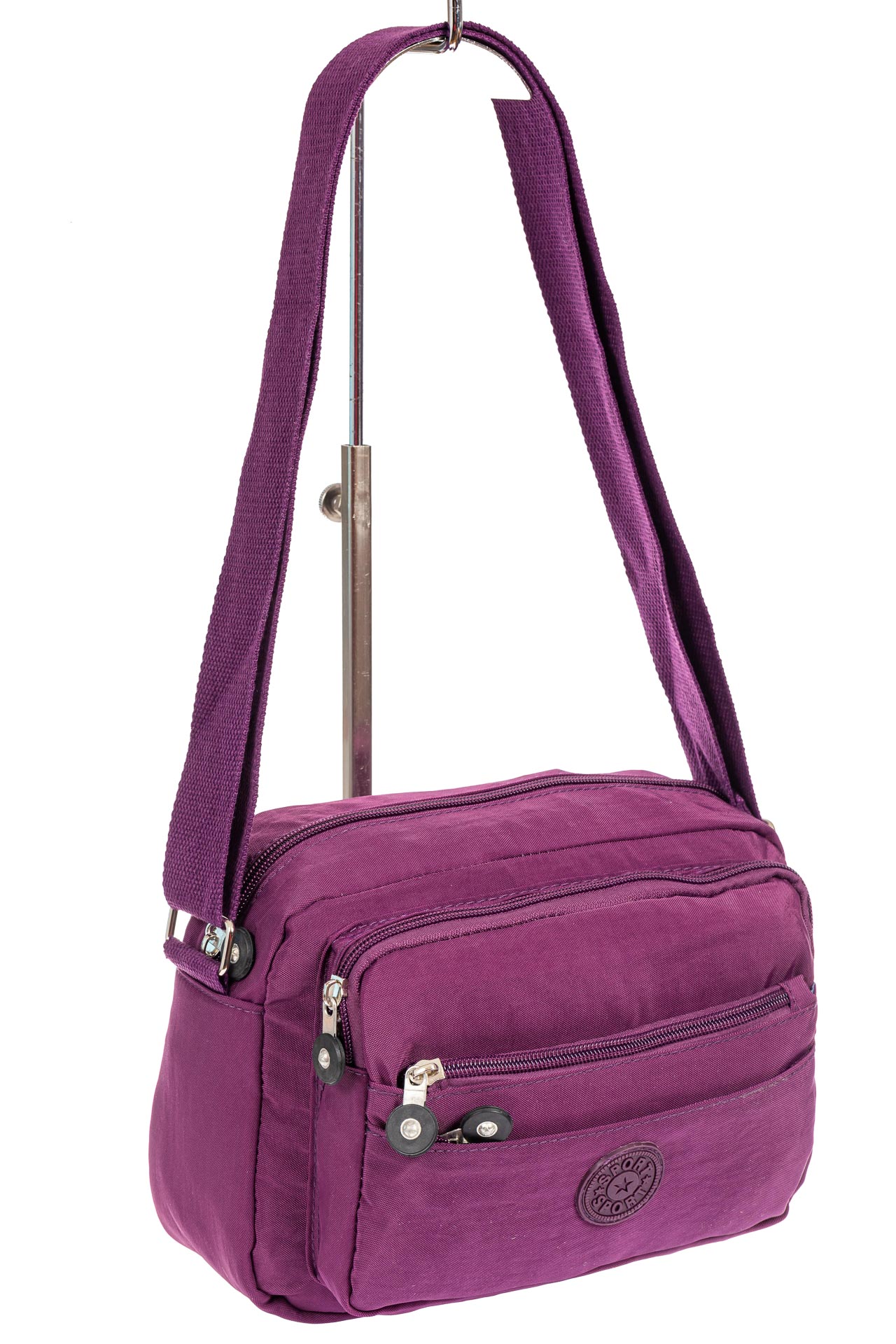 На фото 1 - Женская сумка из ткани кросс-боди, цвет фиолетовый