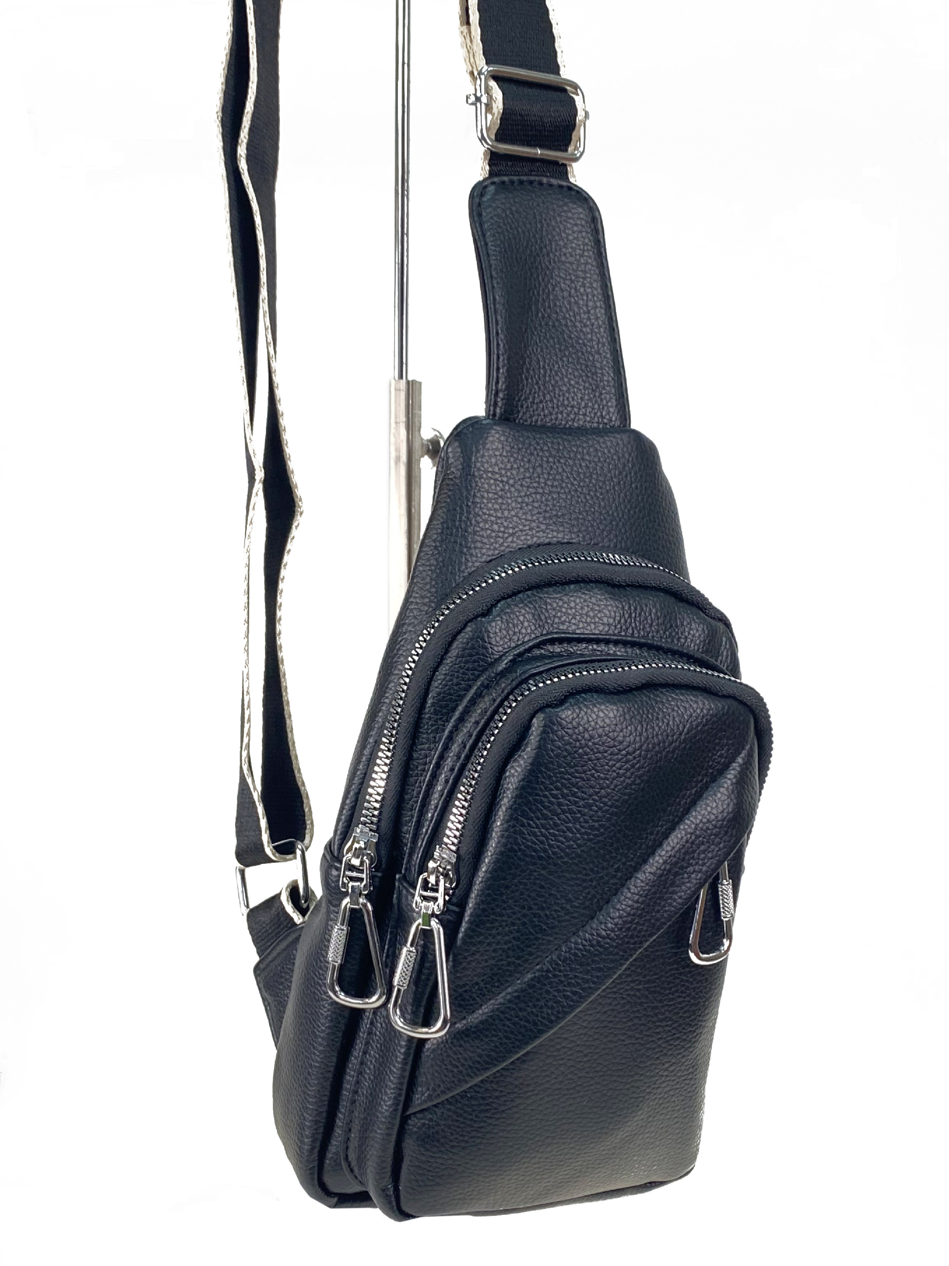 На фото 3 - Женская сумка-слинг из искусственной кожи, цвет черный