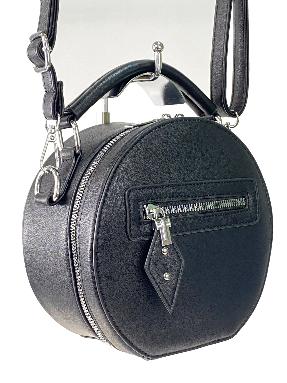 На фото 1 - Круглая женская сумочка из искусственной кожи, цвет чёрный