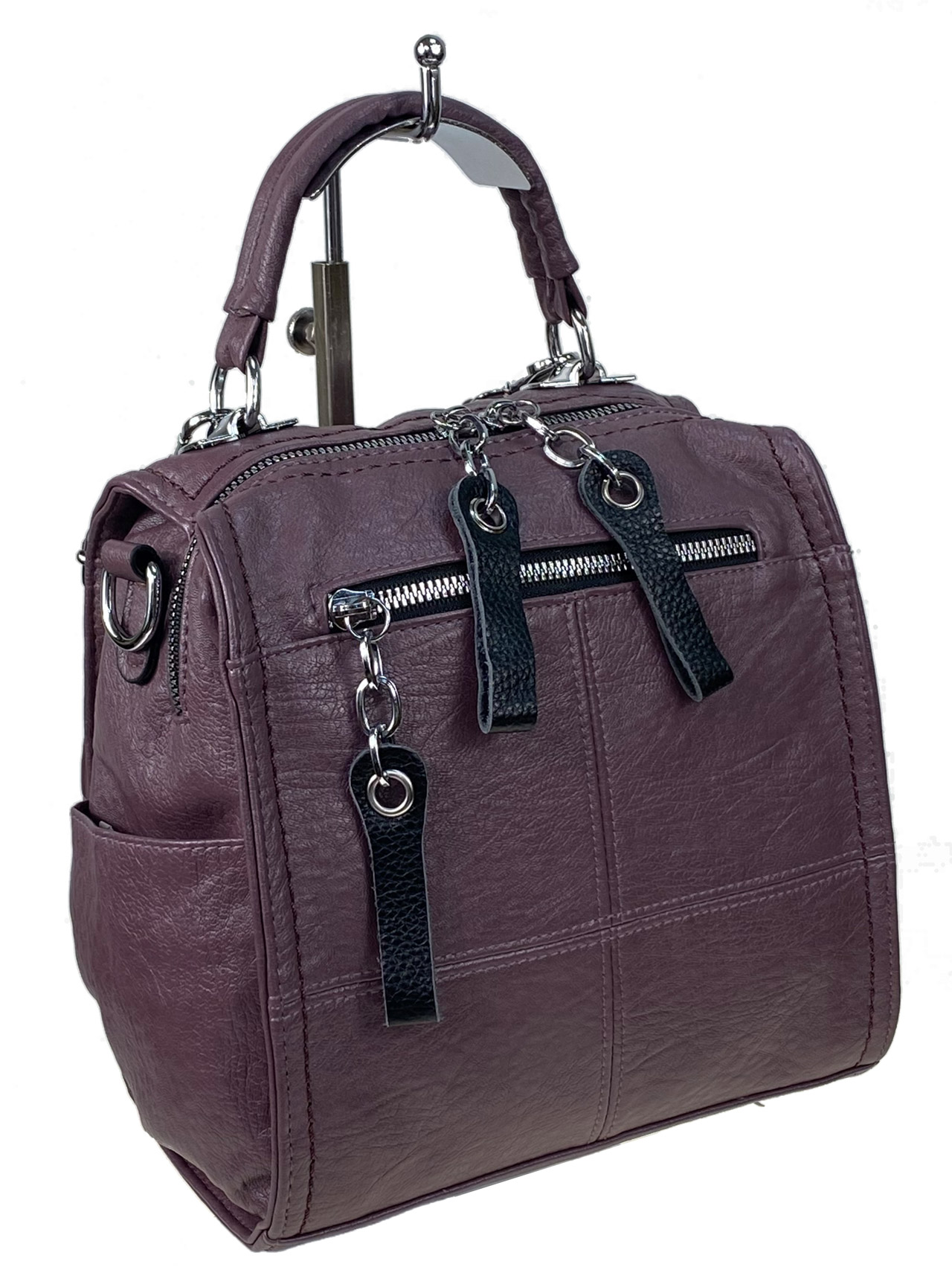 На фото 1 - Женская сумка-рюкзак трансформер из искусственной кожи цвет фиолетовый