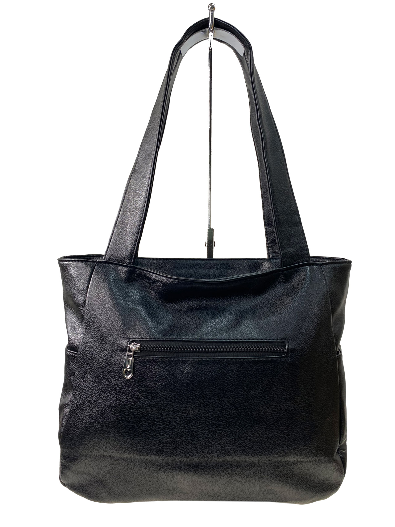 На фото 2 -  Женская сумка из искусственной кожи, цвет черный
