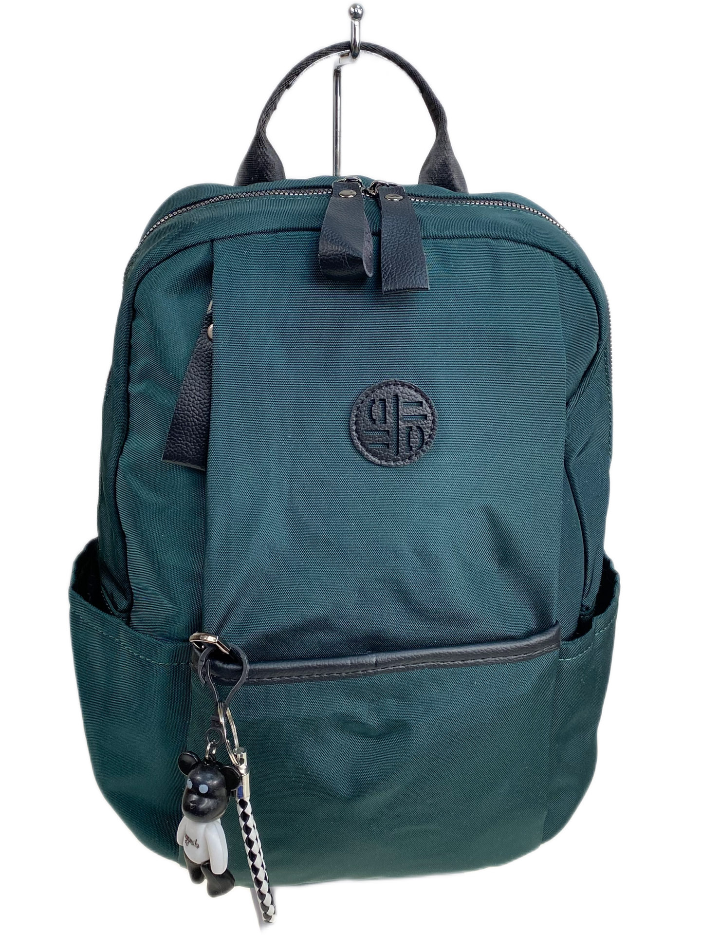 На фото 1 - Женский рюкзак из текстиля, цвет зеленый