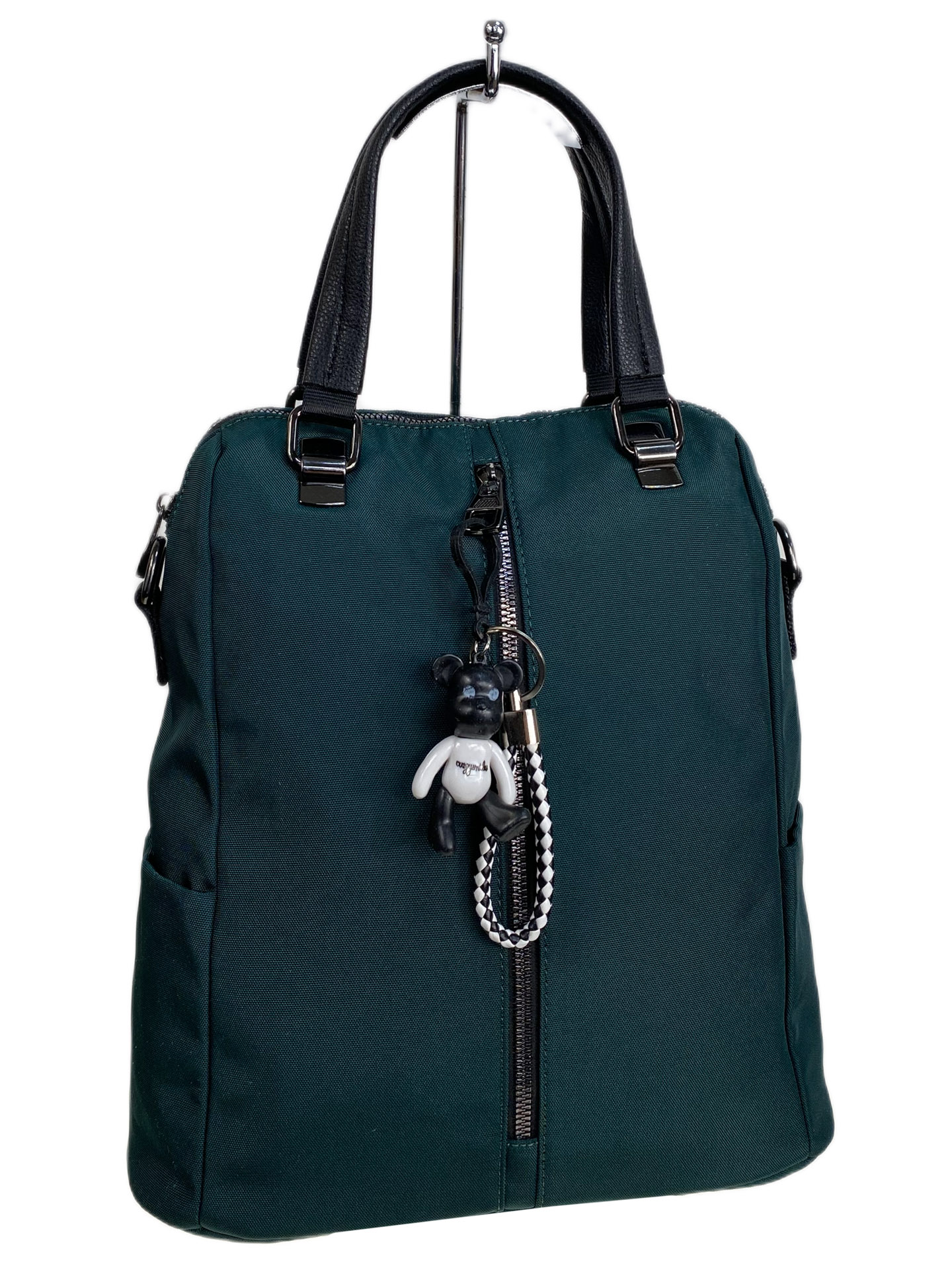 На фото 1 - Женская сумка - рюкзак из текстиля, цвет  зеленый