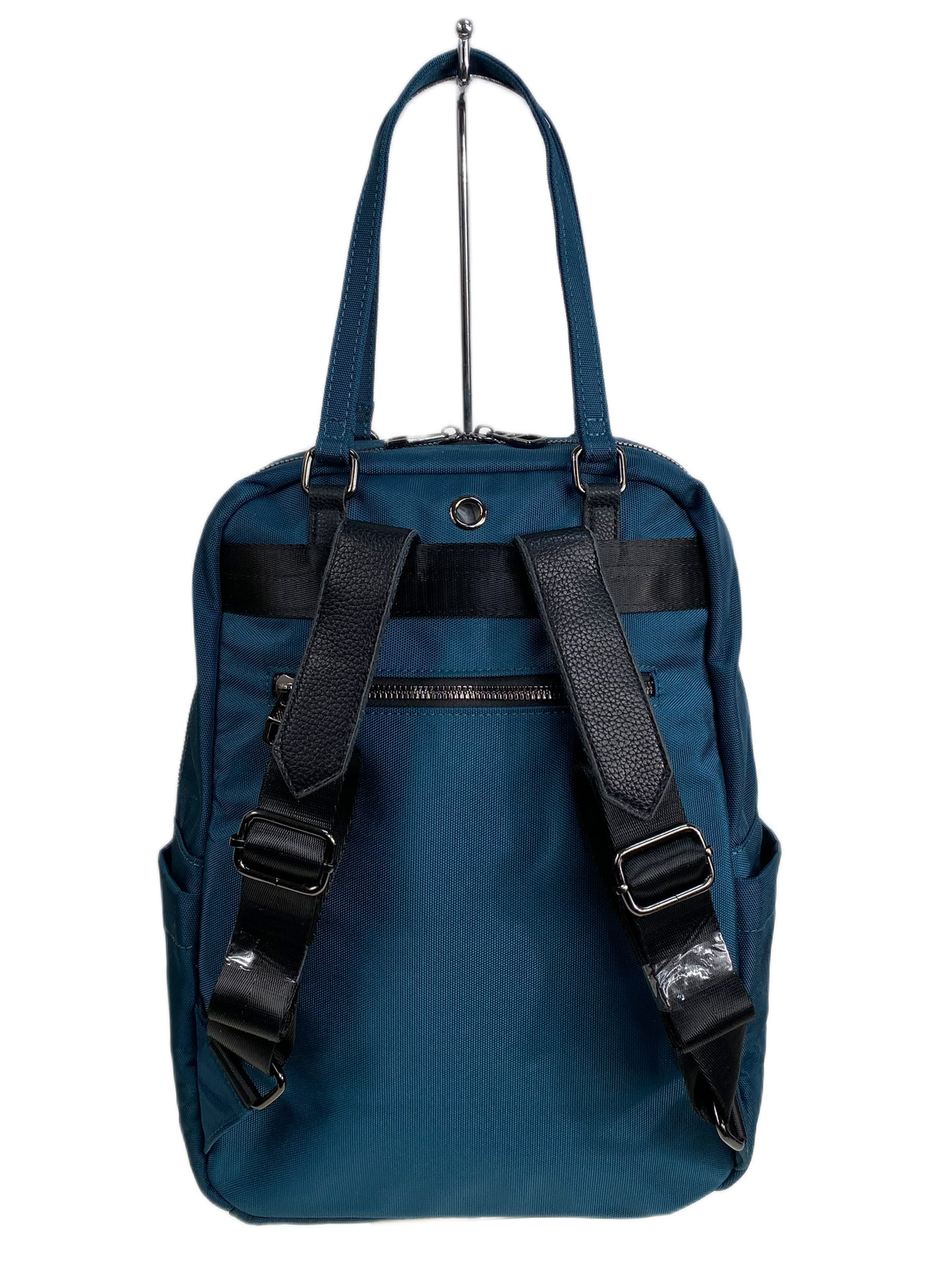 На фото 2 - Женская сумка - рюкзак из текстиля, цвет изумрудный