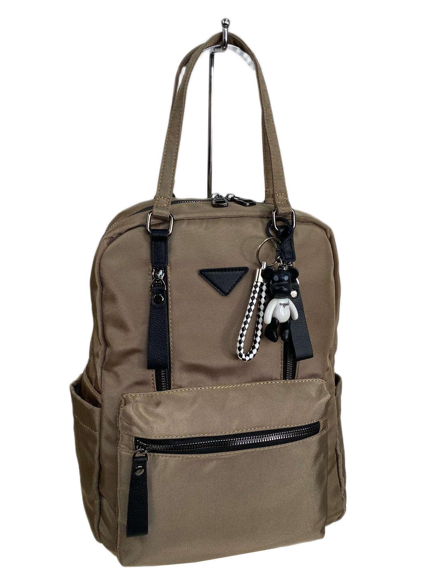 На фото 1 - Женская сумка - рюкзак из текстиля, цвет коричневый