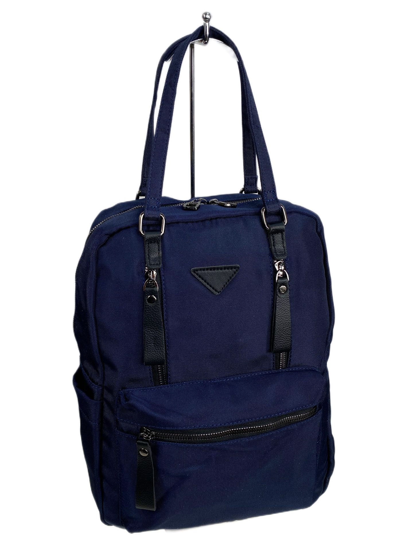 На фото 1 - Женская сумка - рюкзак из текстиля, цвет синий