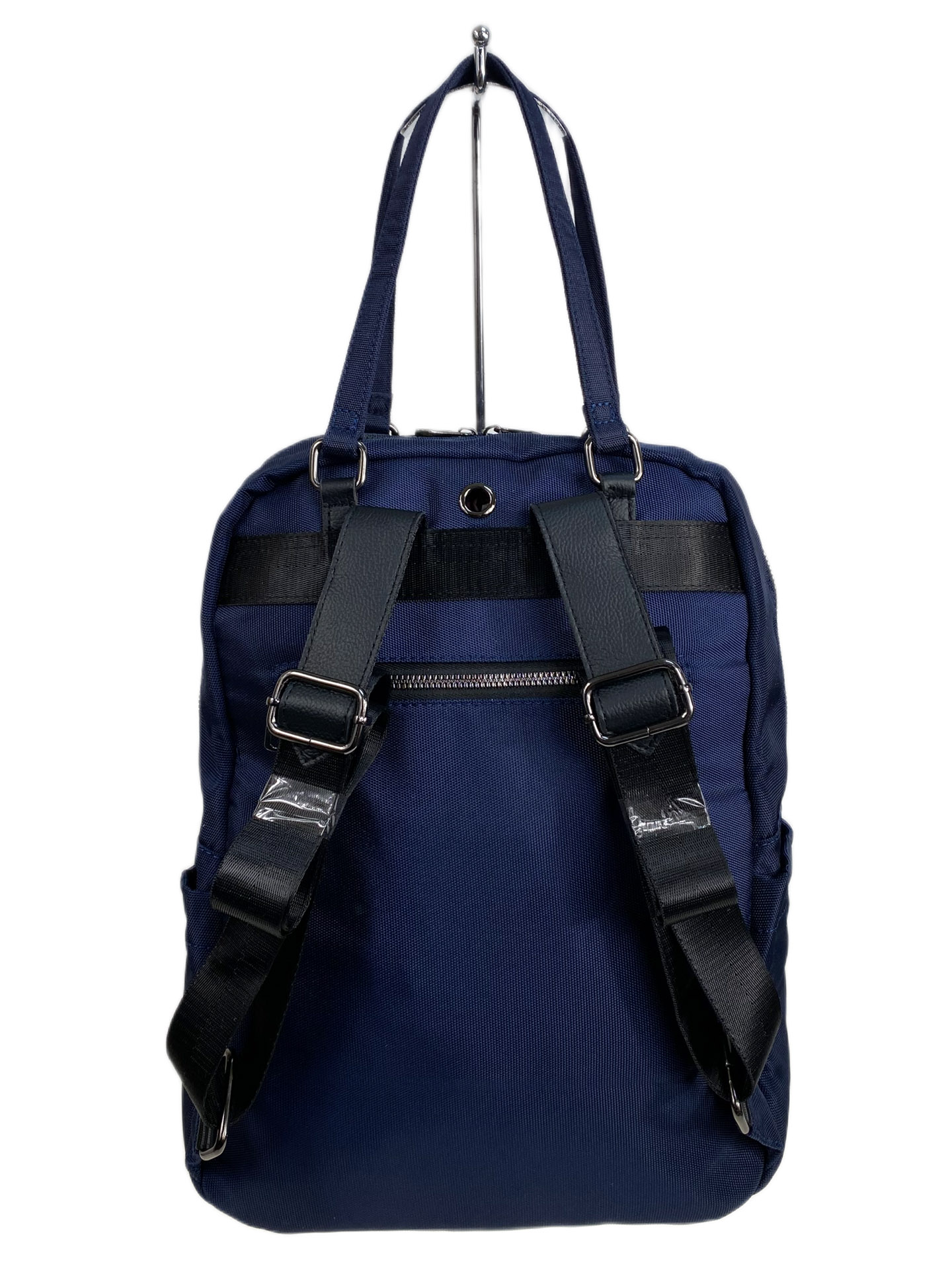 На фото 2 - Женская сумка - рюкзак из текстиля, цвет синий