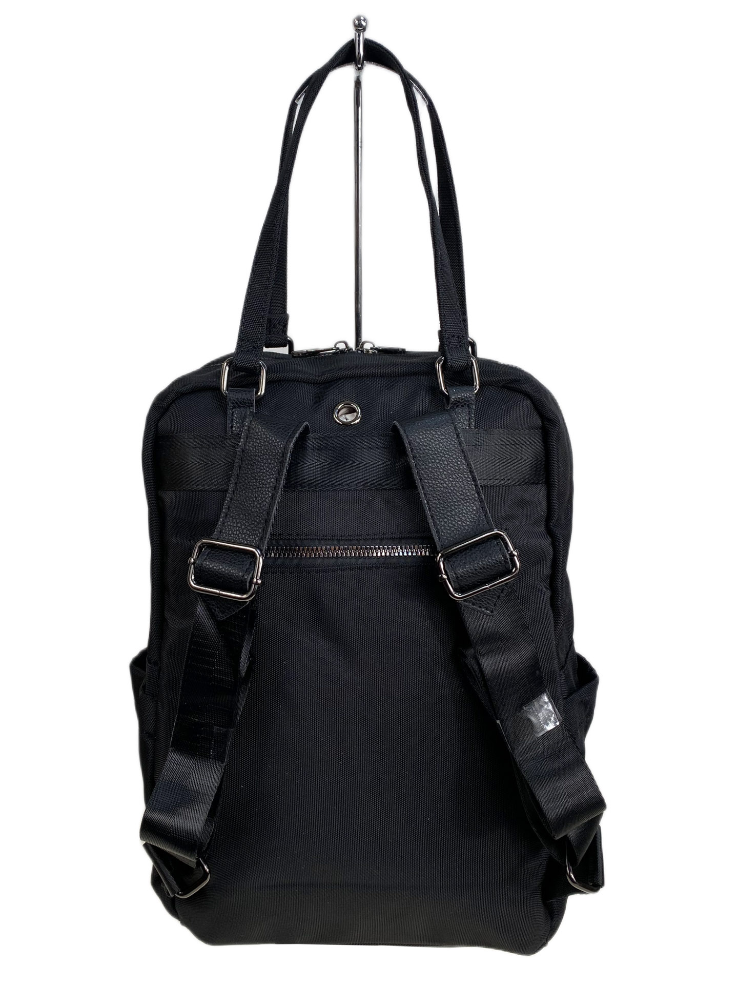 На фото 2 - Женская сумка - рюкзак из текстиля, цвет черный