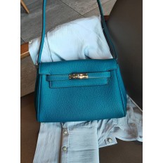 На фото 2 - Кожаная женская сумка-портфель, цвет бирюзово-зеленый