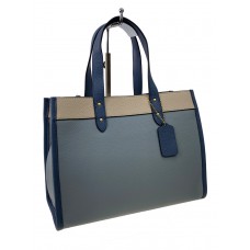 На фото 1 - Женская сумка  из натуральной кожи, цвет  голубой с молочным и синим