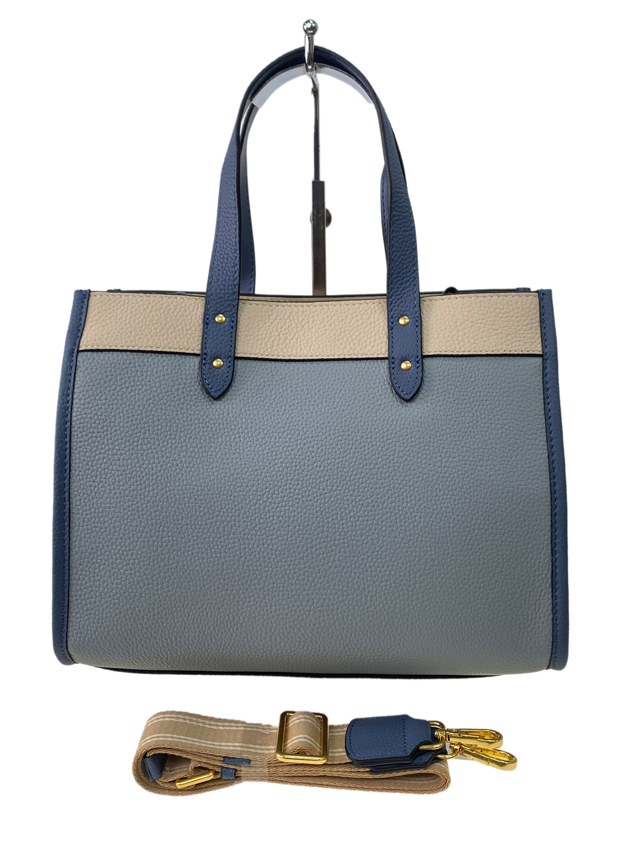На фото 3 - Женская сумка  из натуральной кожи, цвет  голубой с молочным и синим