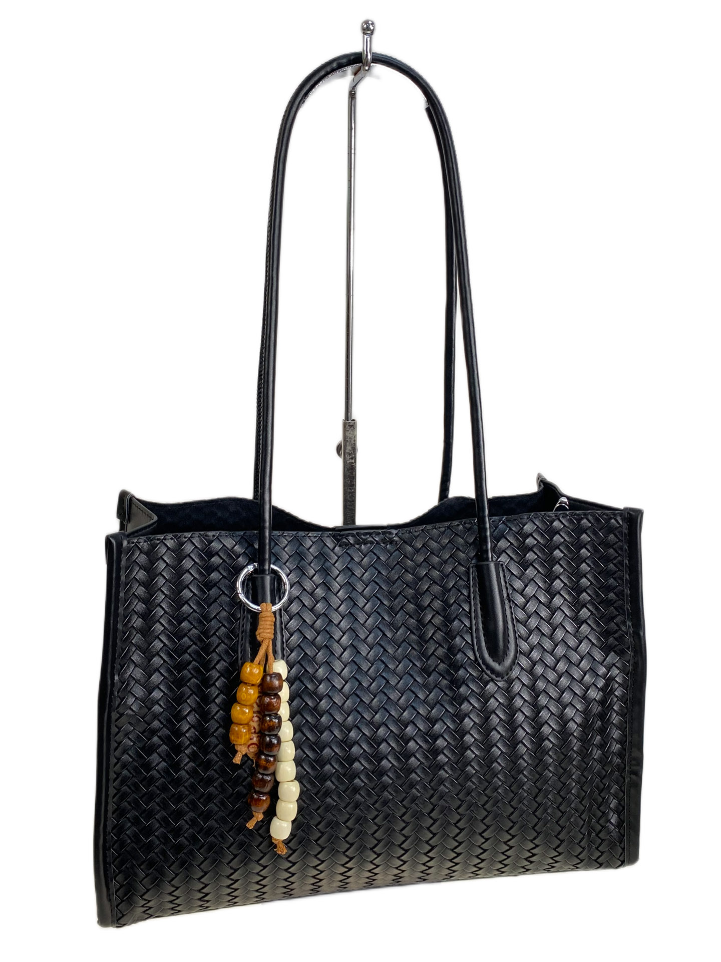 На фото 1 - Женская сумка из искусственной кожи, цвет черный 