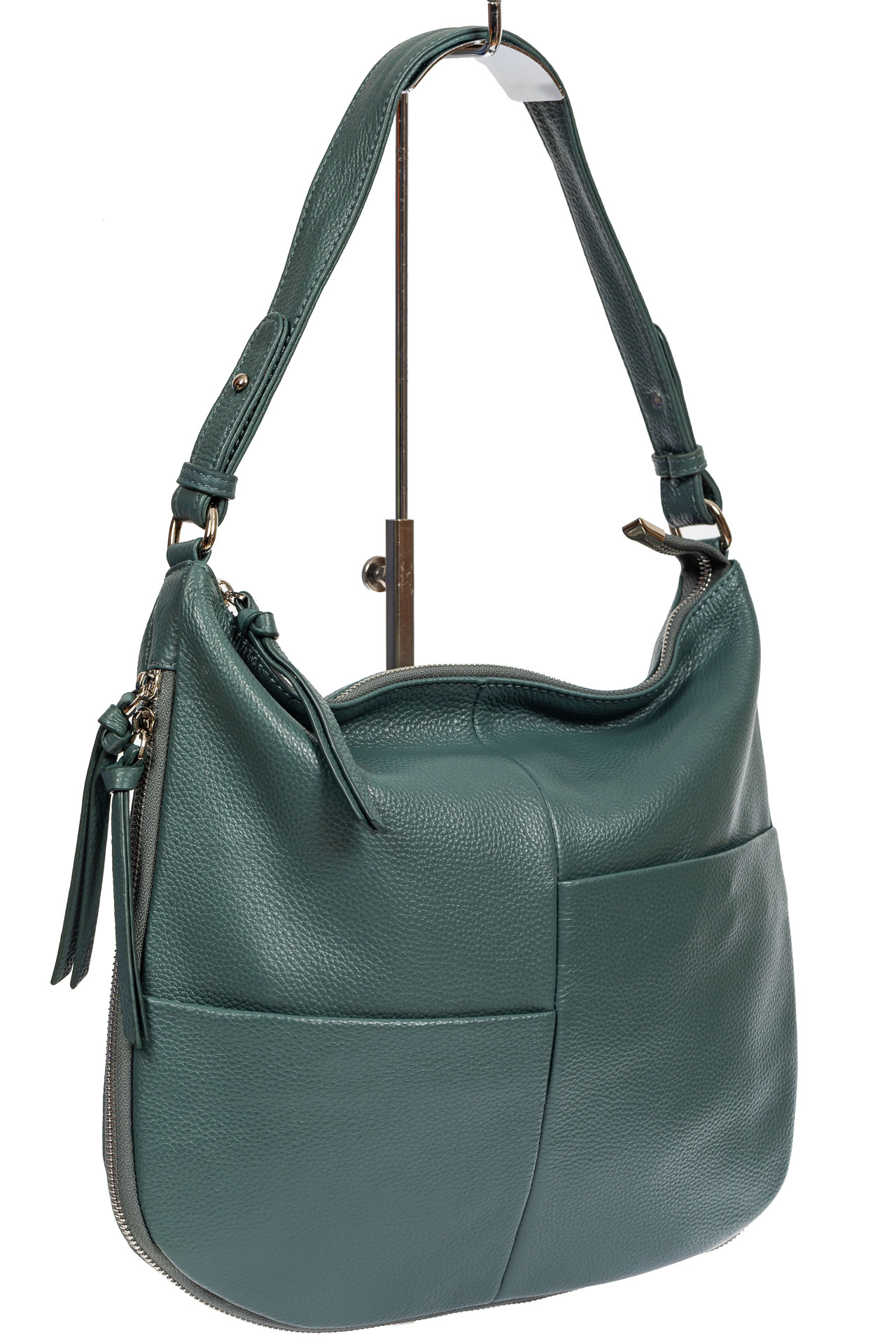 На фото 1 - Женская сумка хобо из натуральной кожи с асимметричными карманами, цвет бирюзовый
