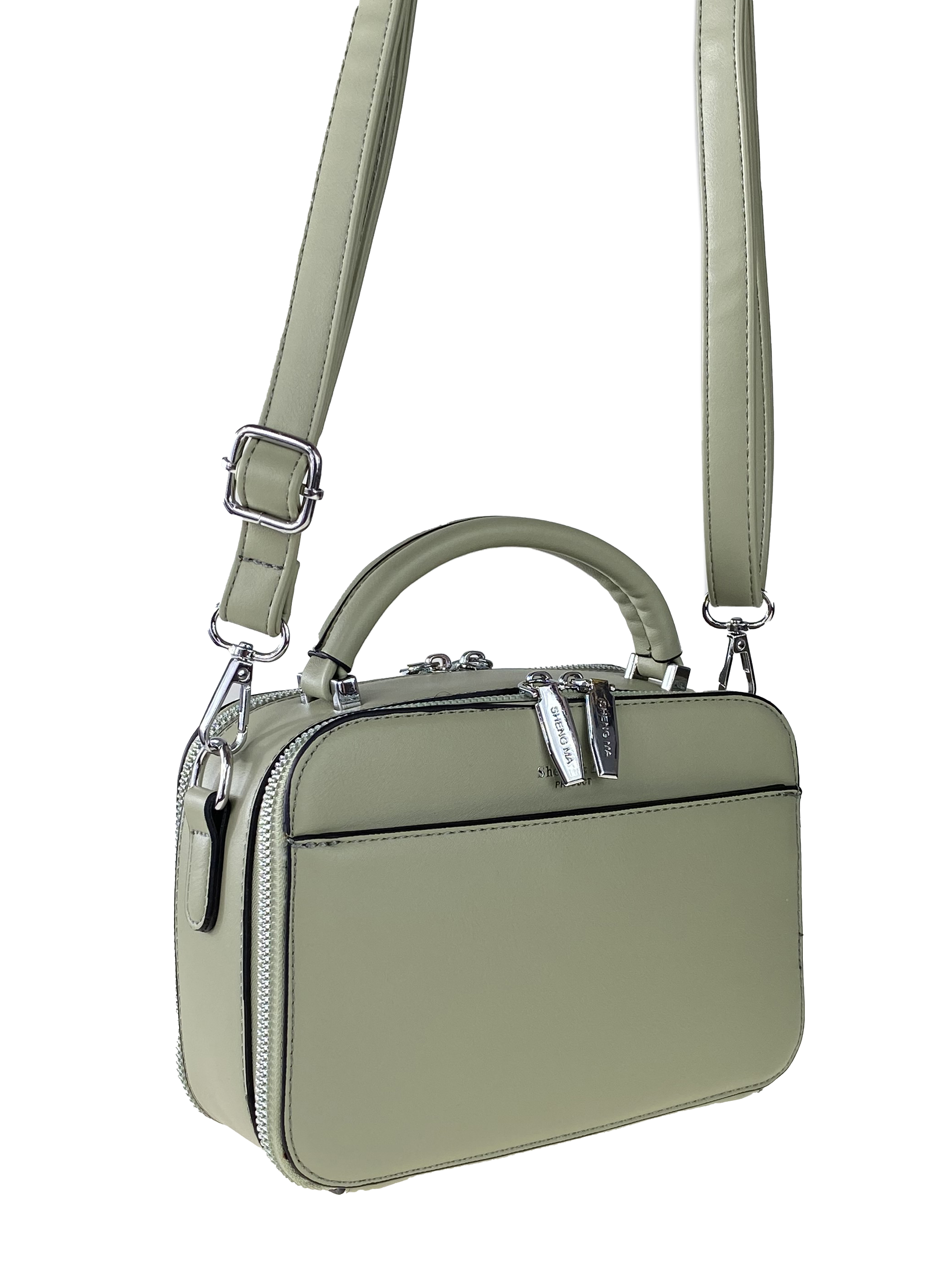 На фото 1 - Женская сумочка из гладкой экокожи с жёстким каркасом, цвет светло-зелёный