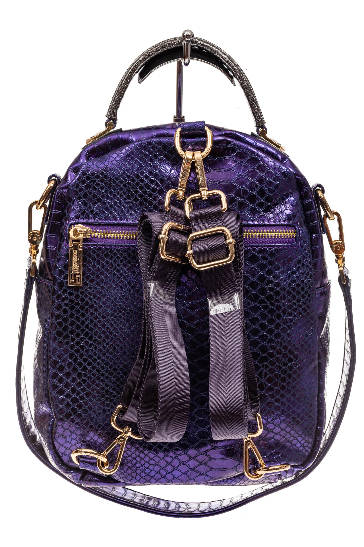На фото 3 - Женский рюкзак из кожи с тиснением, цвет фиолетовый