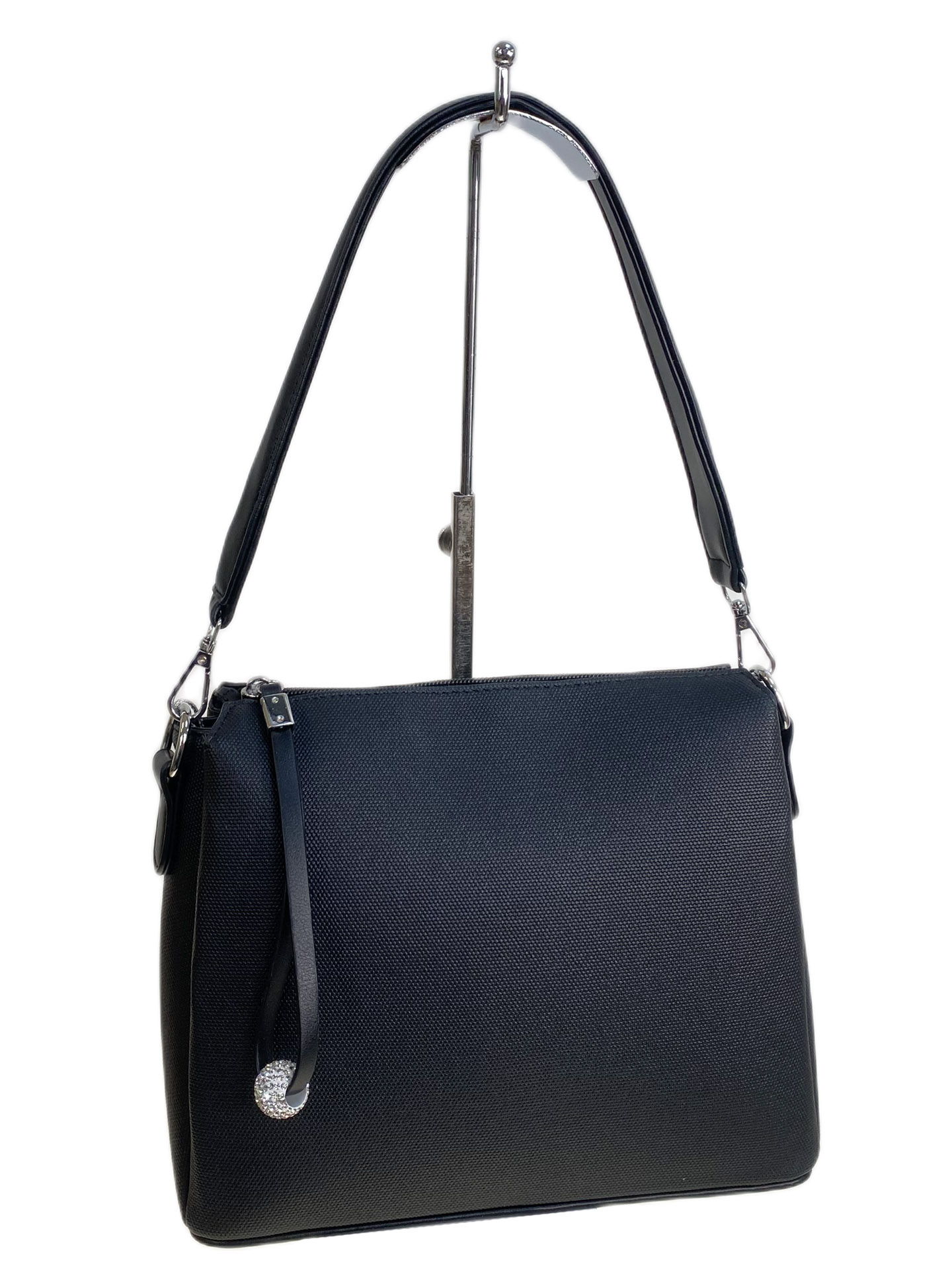 На фото 1 - Женская сумка из искусственной кожи, цвет черный