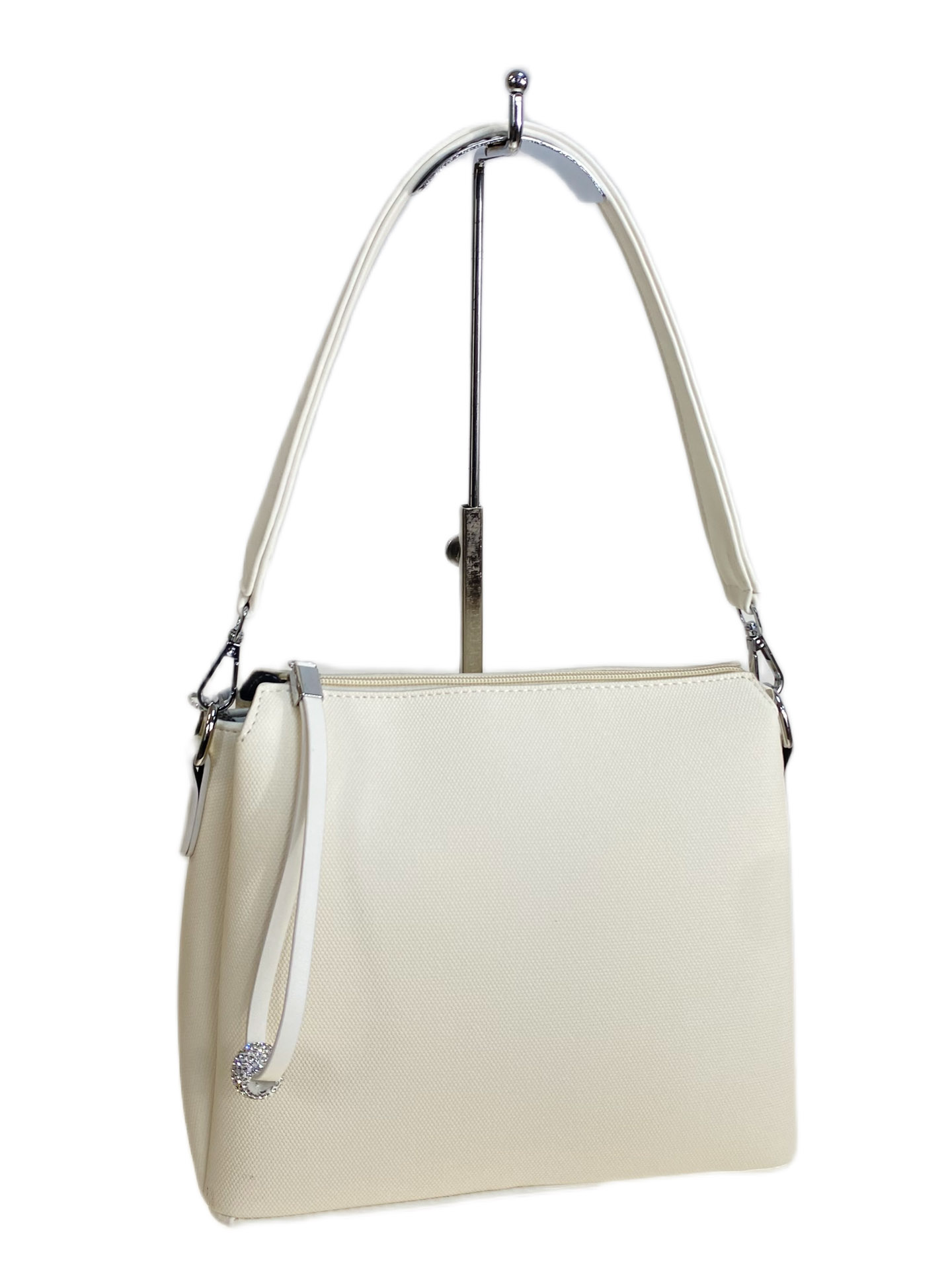 На фото 1 - Женская сумка из искусственной кожи, цвет белый