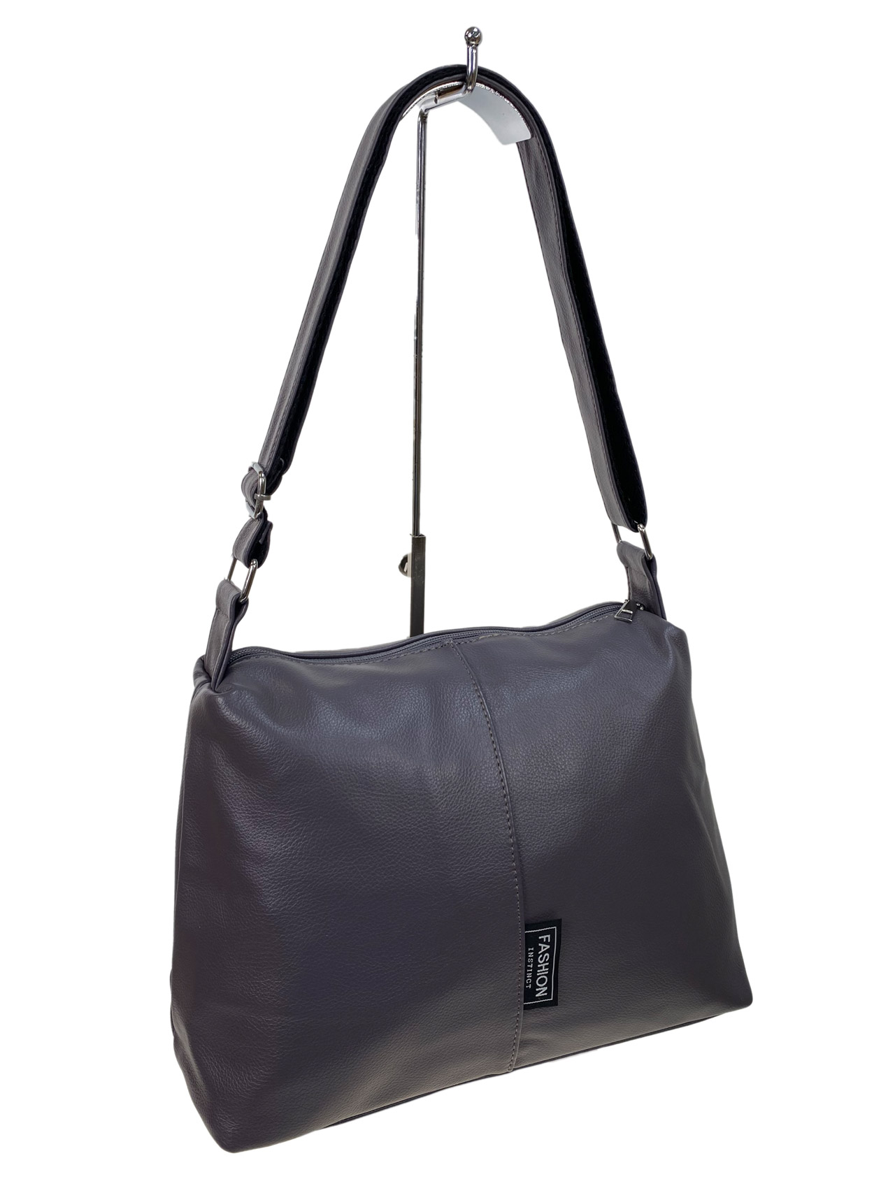 На фото 1 - Женская сумка  из искусственной кожи, цвет сиреневый