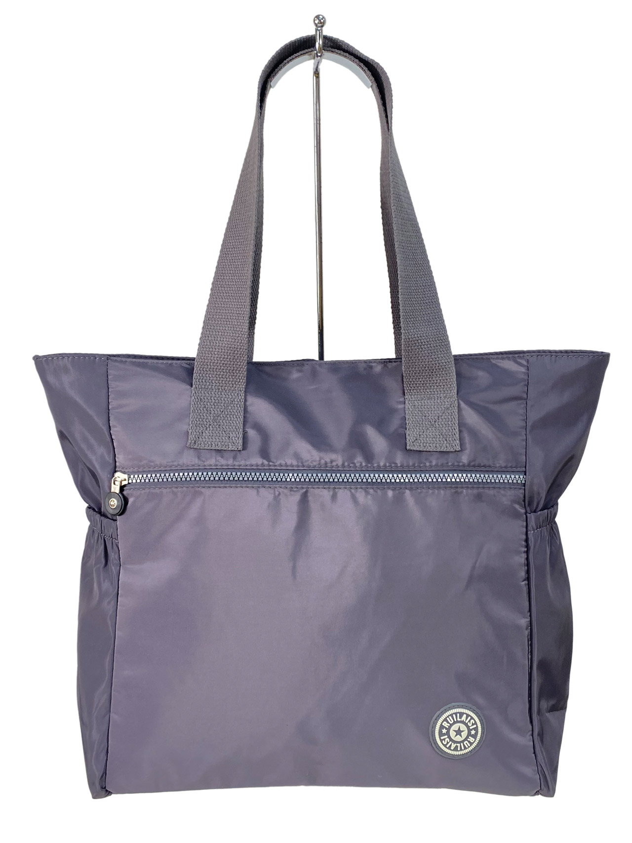 На фото 2 - Женская сумка из водонепромокаемой ткани, цвет фиолетовый