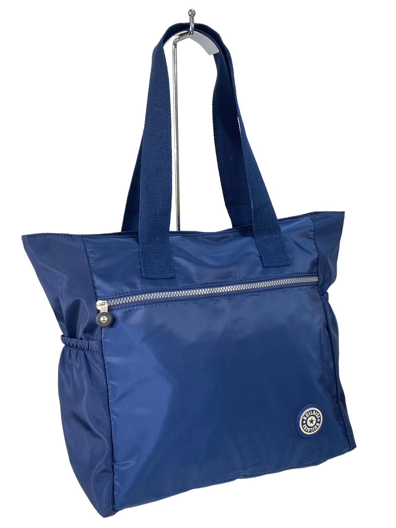 На фото 1 - Женская сумка из водонепромокаемой ткани, цвет синий