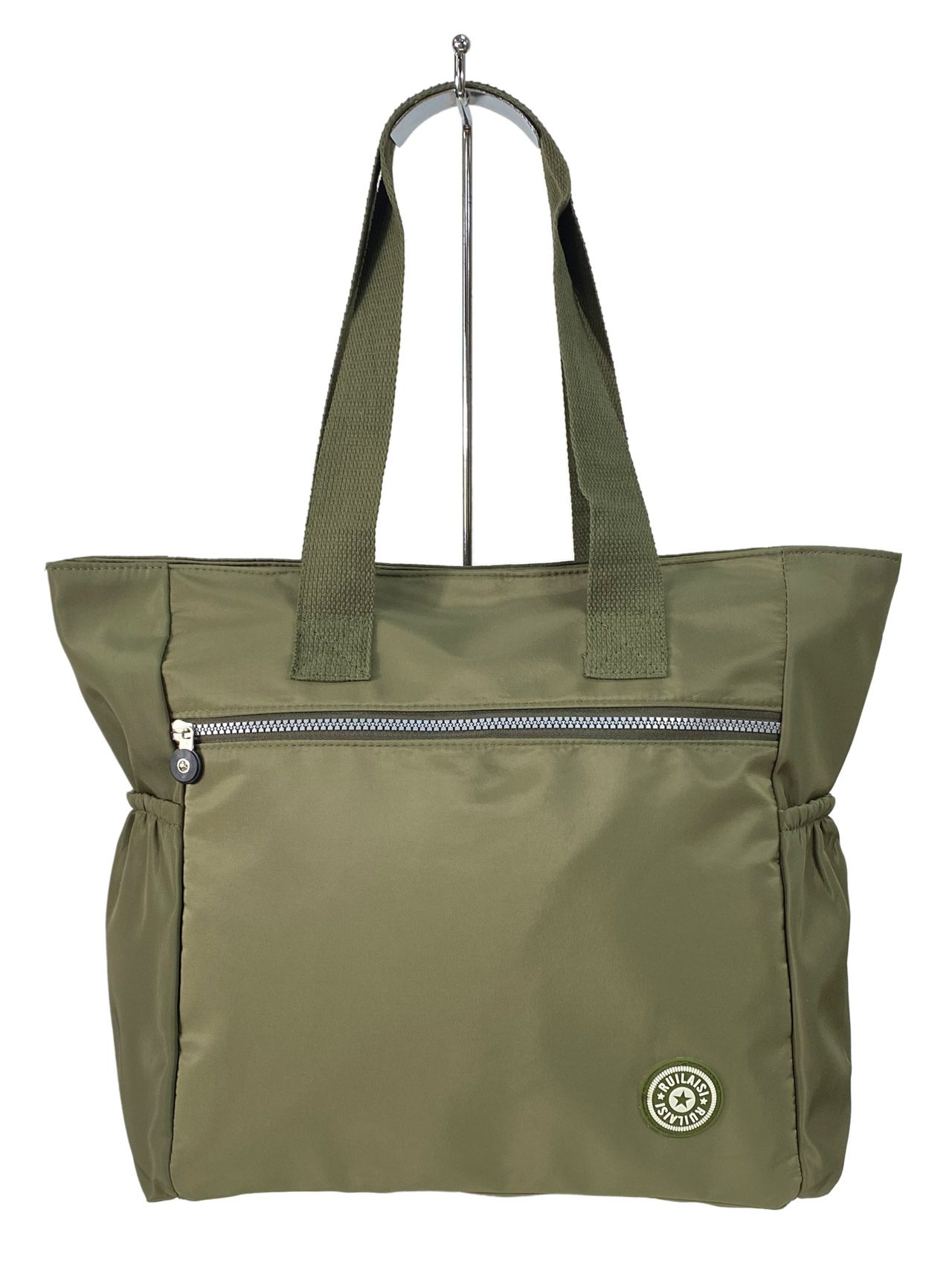 На фото 2 - Женская сумка из водонепромокаемой ткани, цвет зеленый