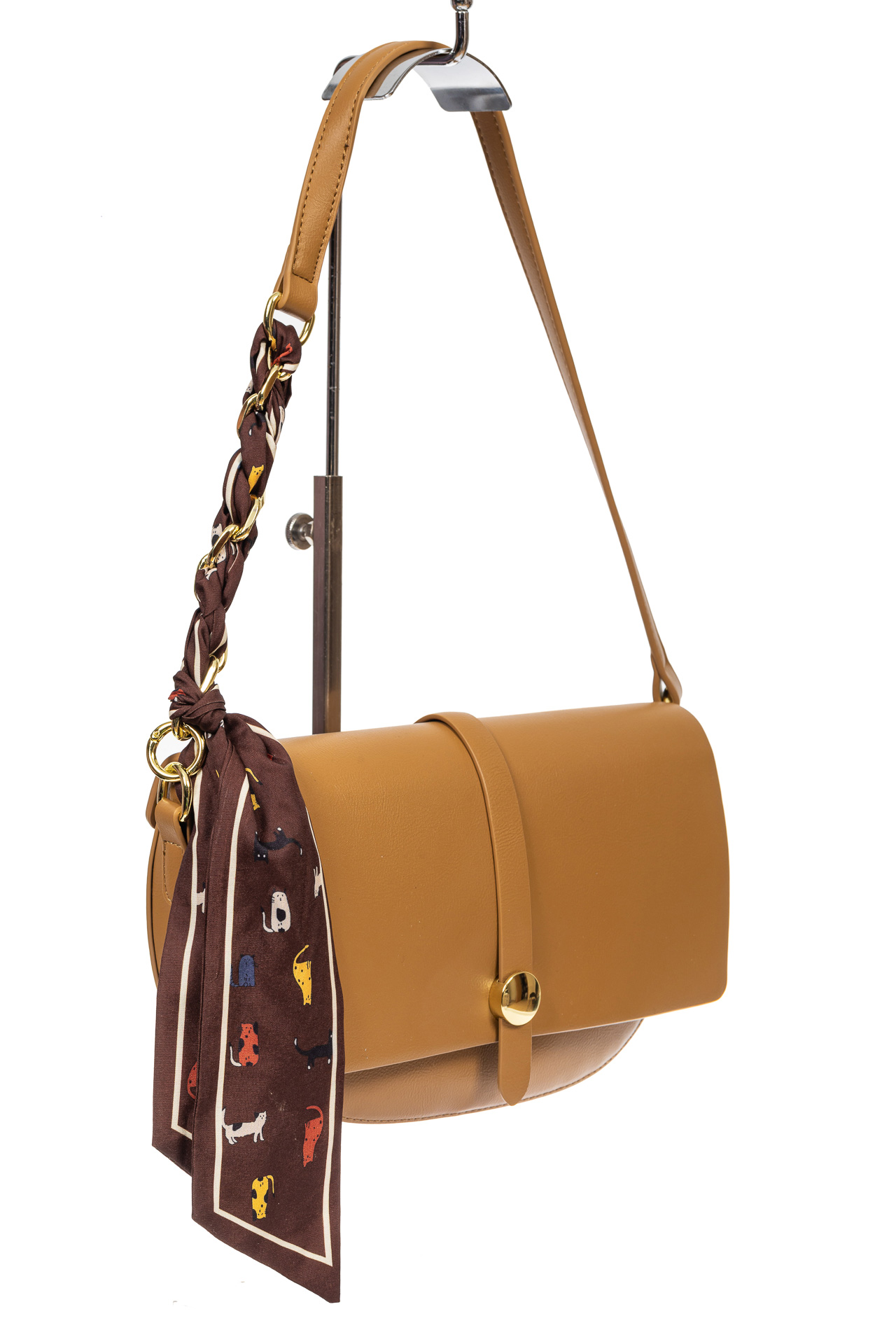 На фото 1 - Женская сумка-седло из искусственной кожи с твилли, светлая охра